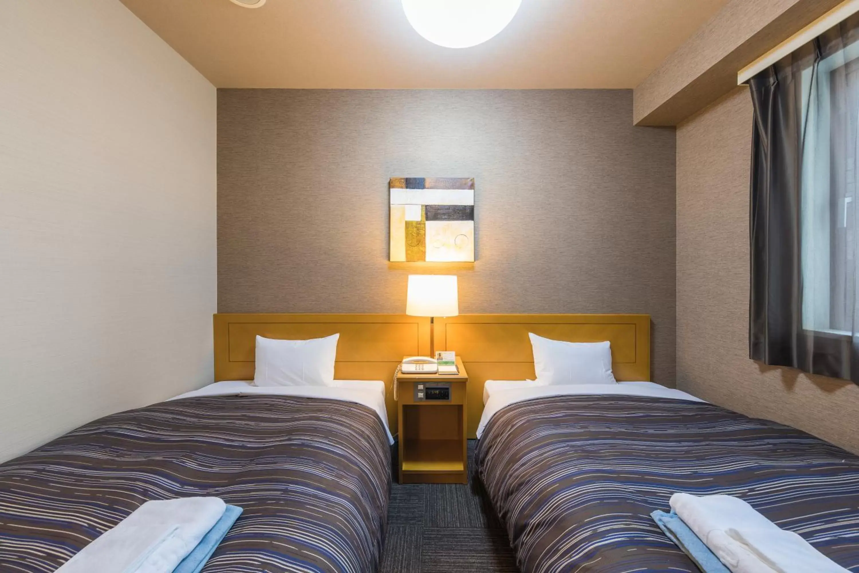 Bed in Route Inn Grantia Hanyu Spa Resort