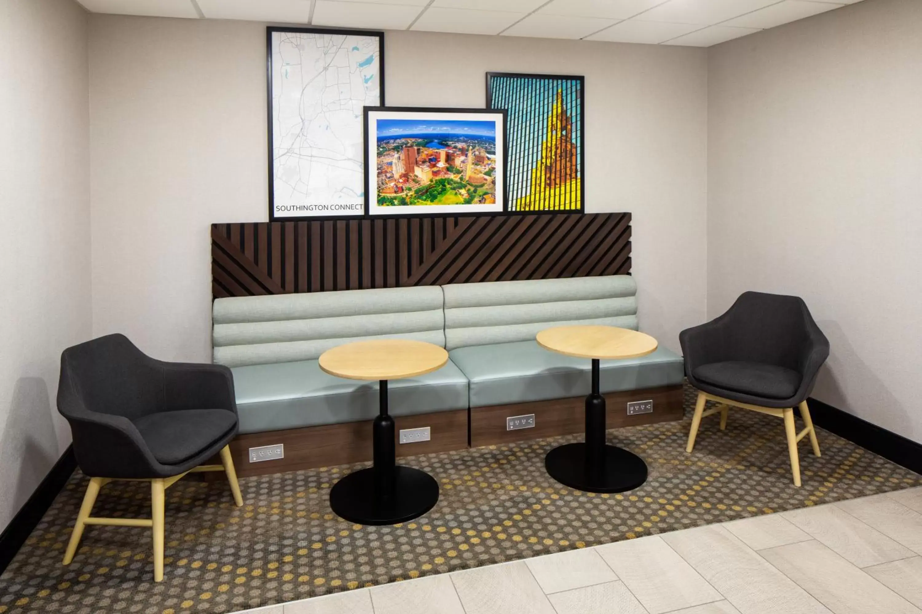 Property building, Seating Area in Holiday Inn - Cheshire - Southington, an IHG Hotel