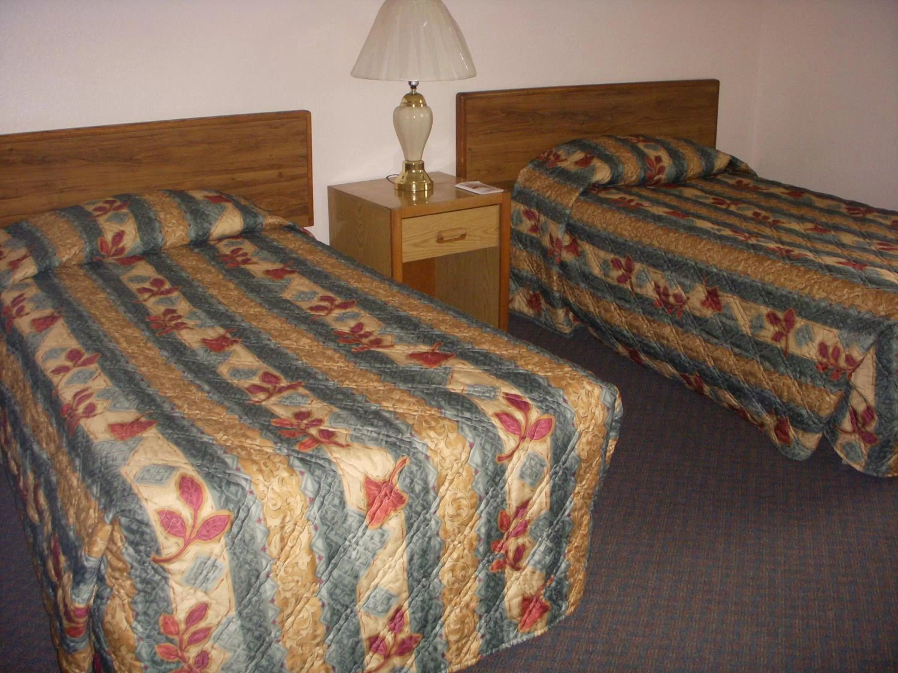 Bed in Apple Tree Inn