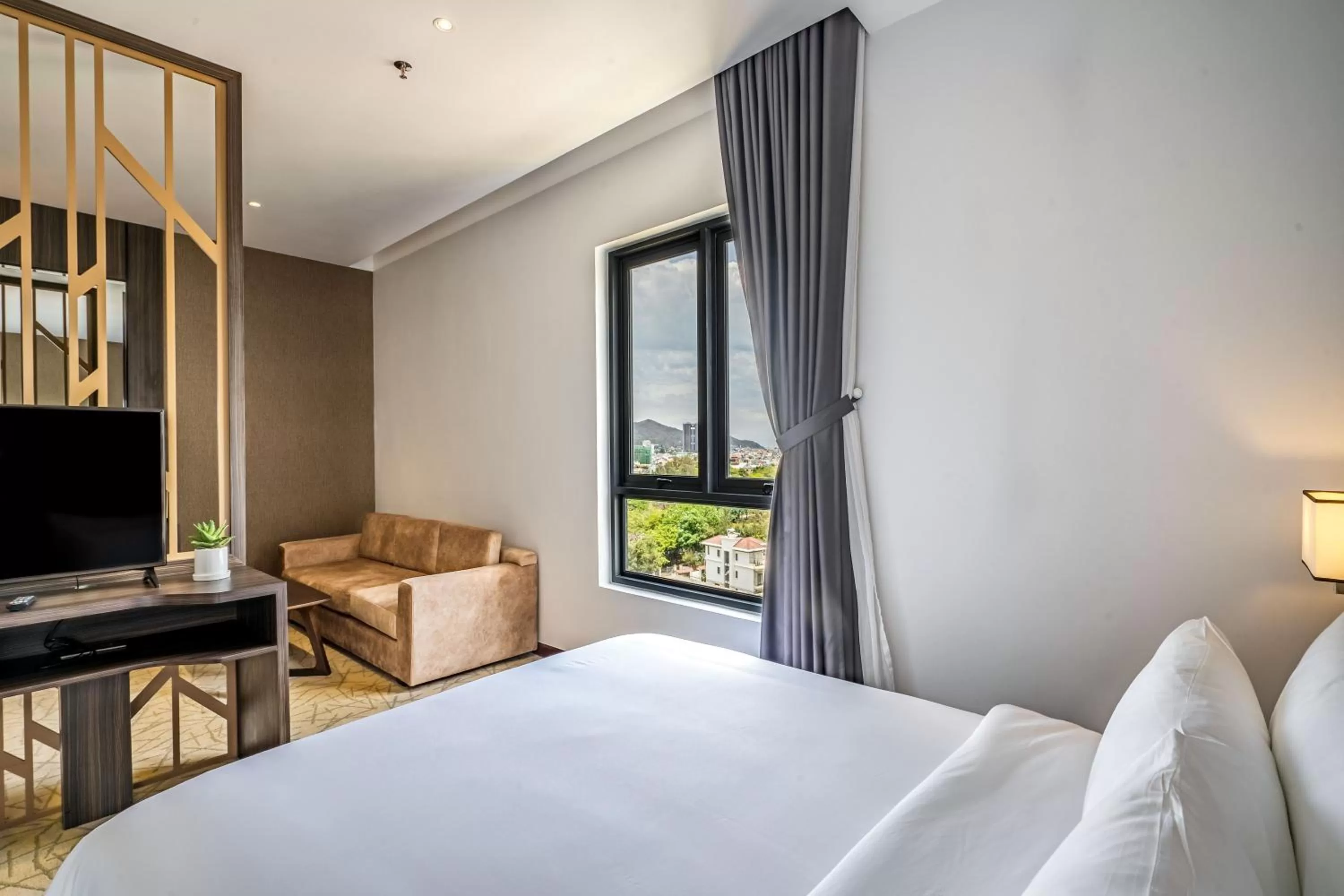 Bed in The Cap Hotel