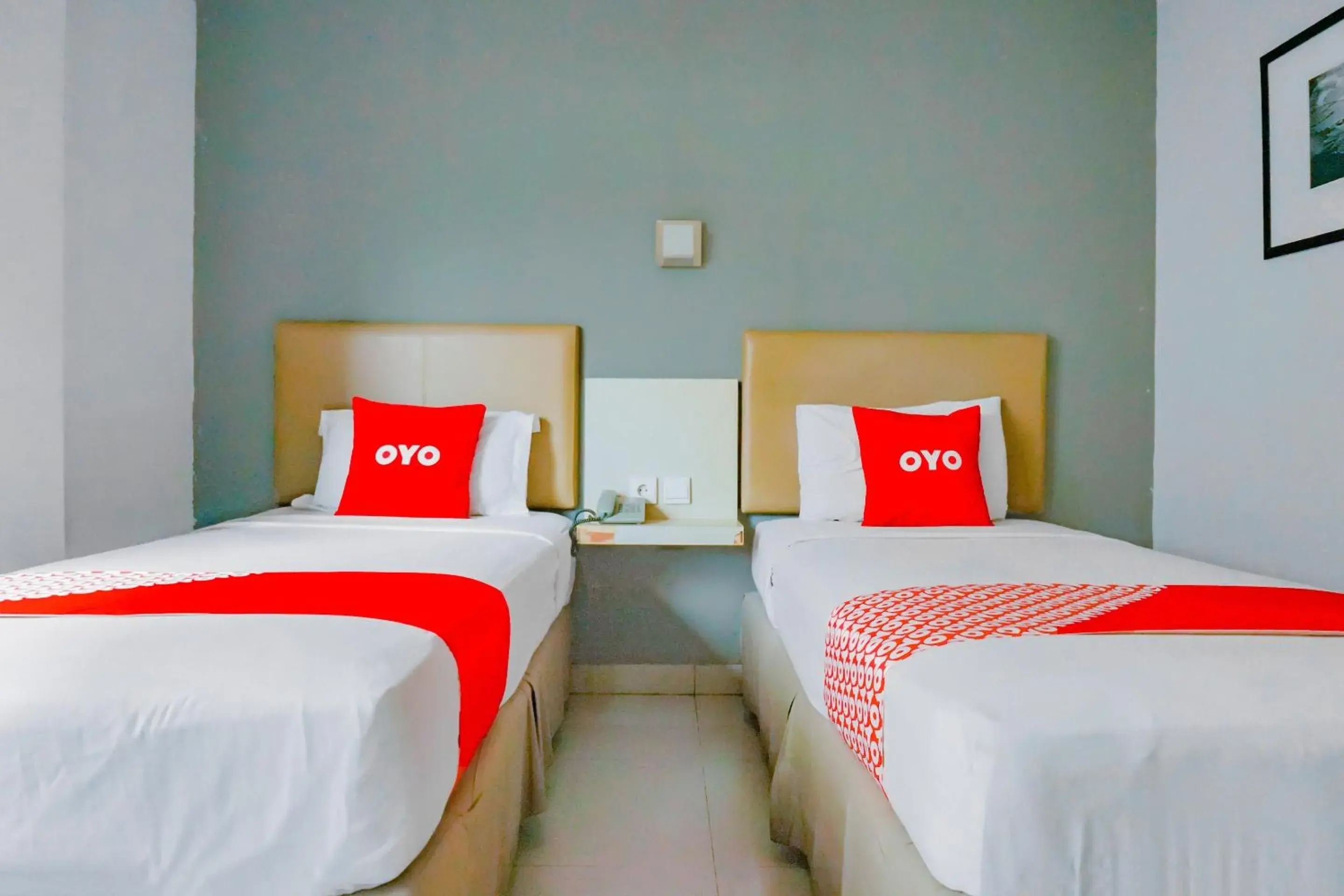 Bedroom in OYO 90244 Hotel Antara