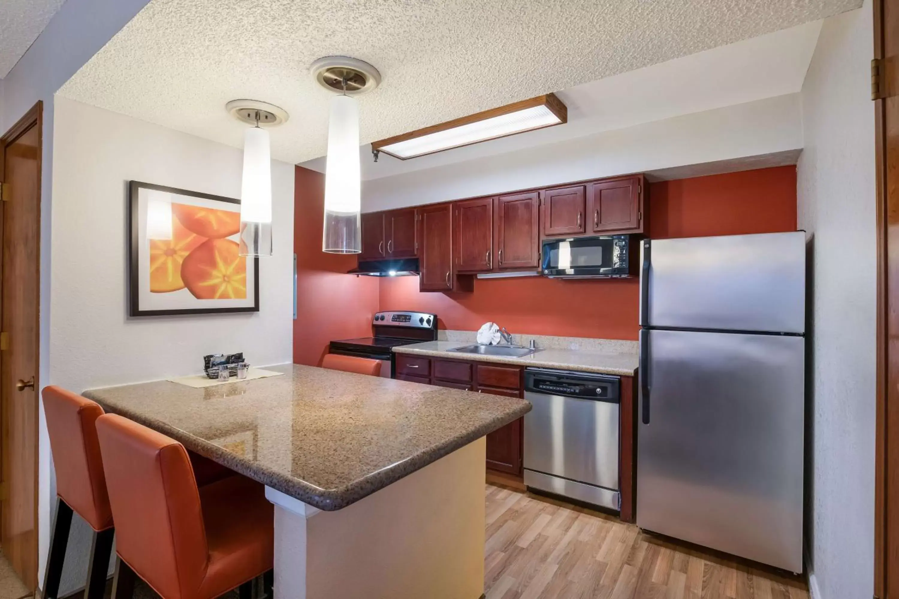 Bedroom, Kitchen/Kitchenette in SenS Suites Livermore; SureStay Collection by Best Western