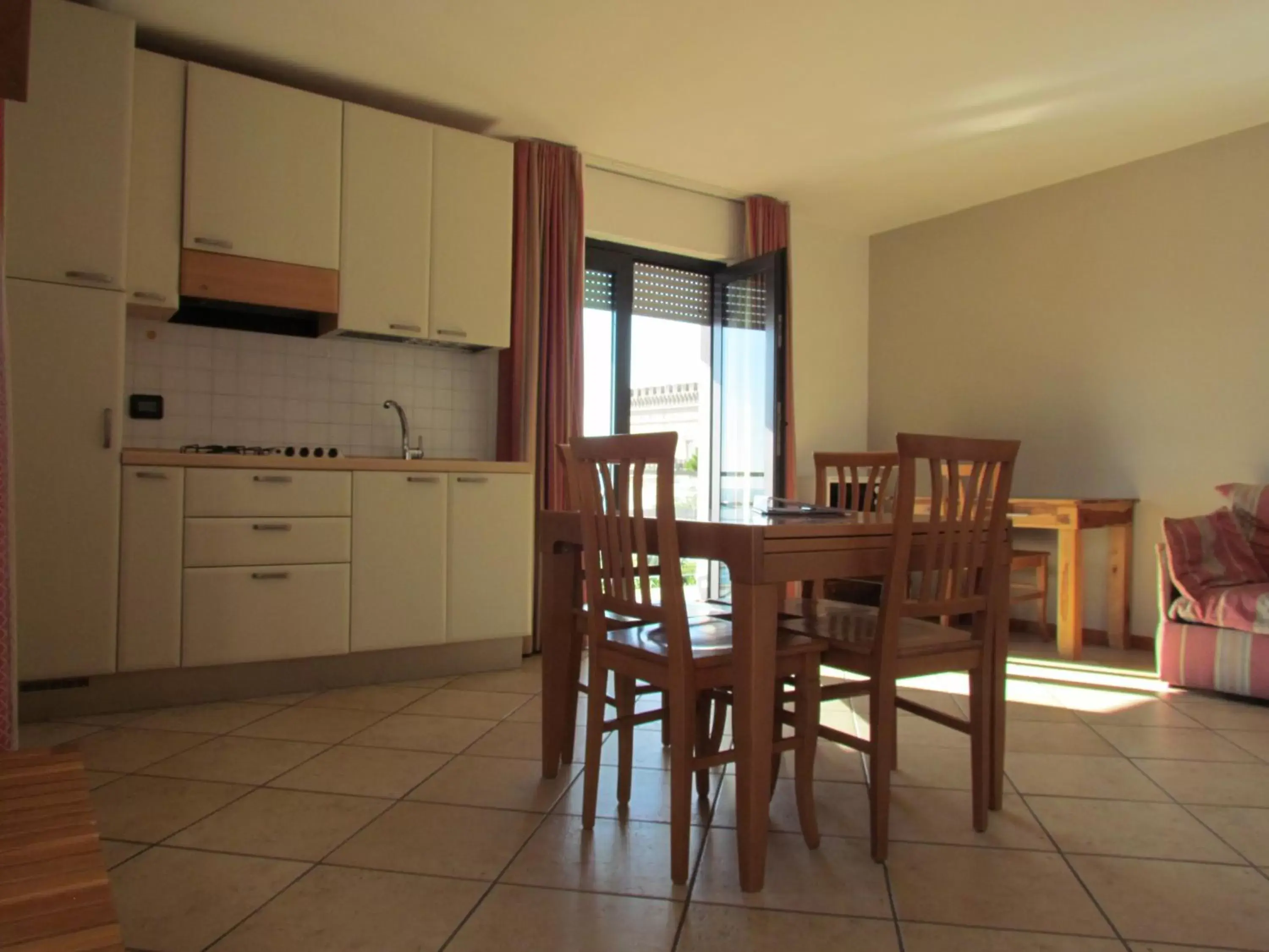 Photo of the whole room, Dining Area in Miramare Residence