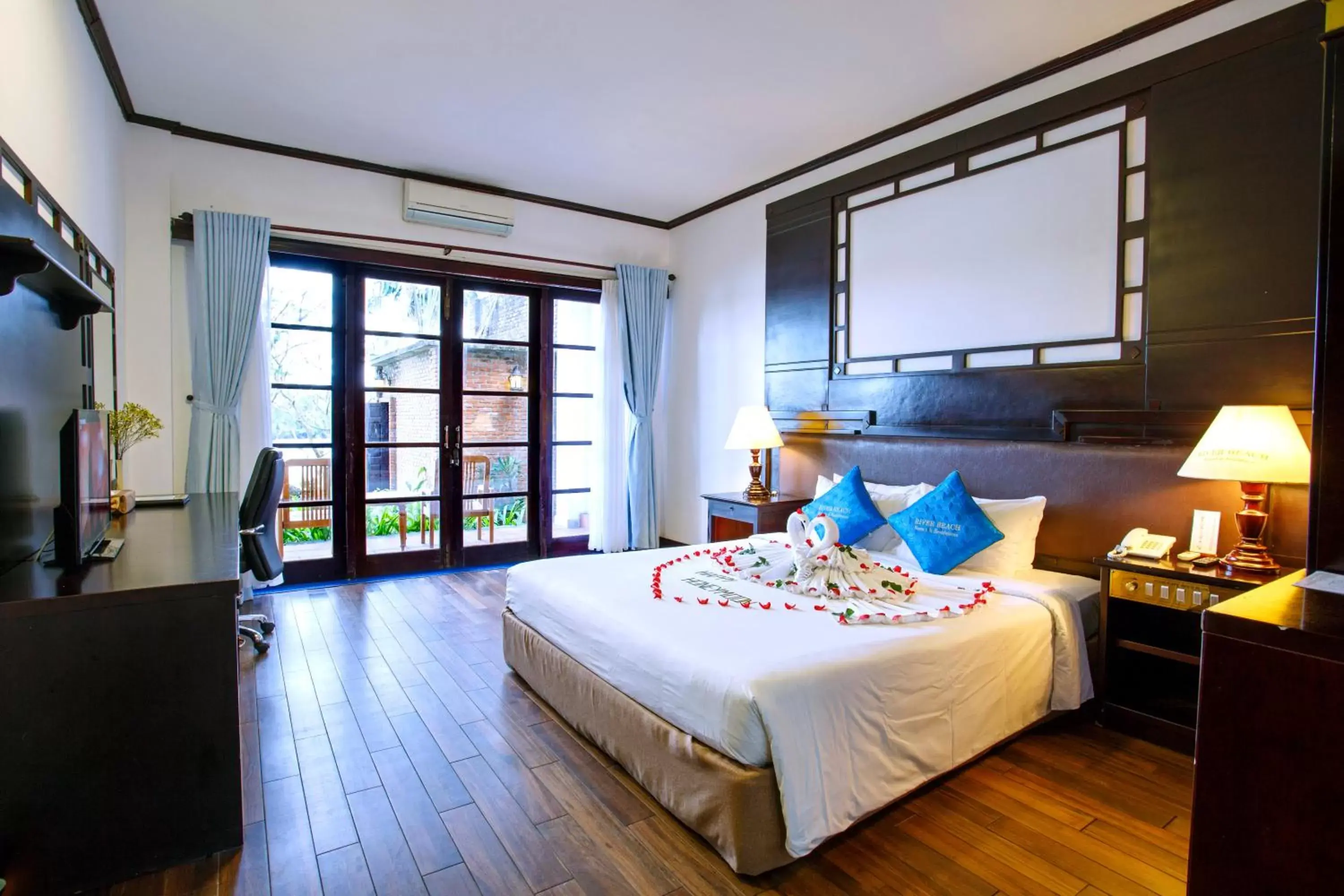 Bed in River Beach Resort & Residences