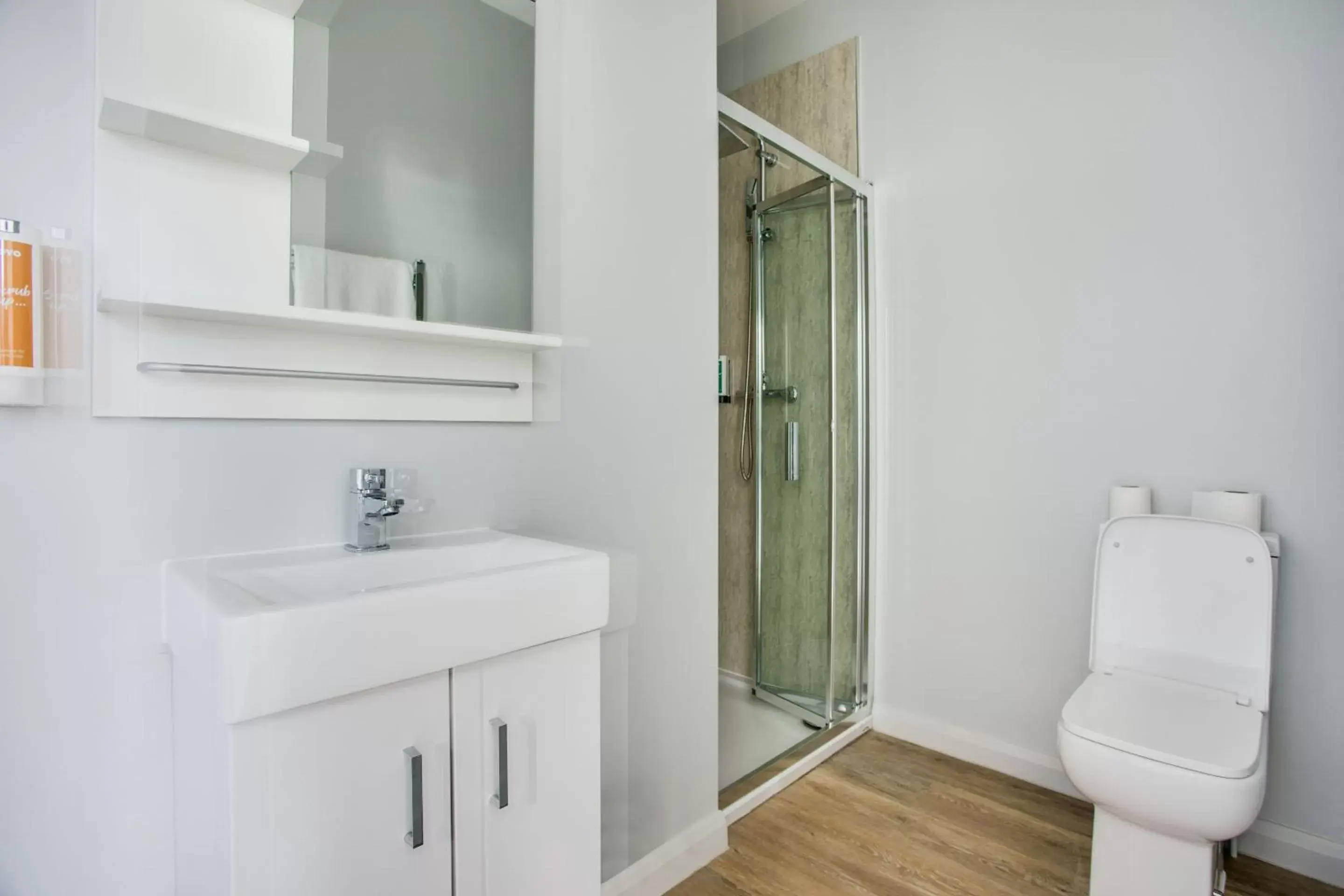 Bathroom in OYO Studiotel GY - Modern Hotel Apartments