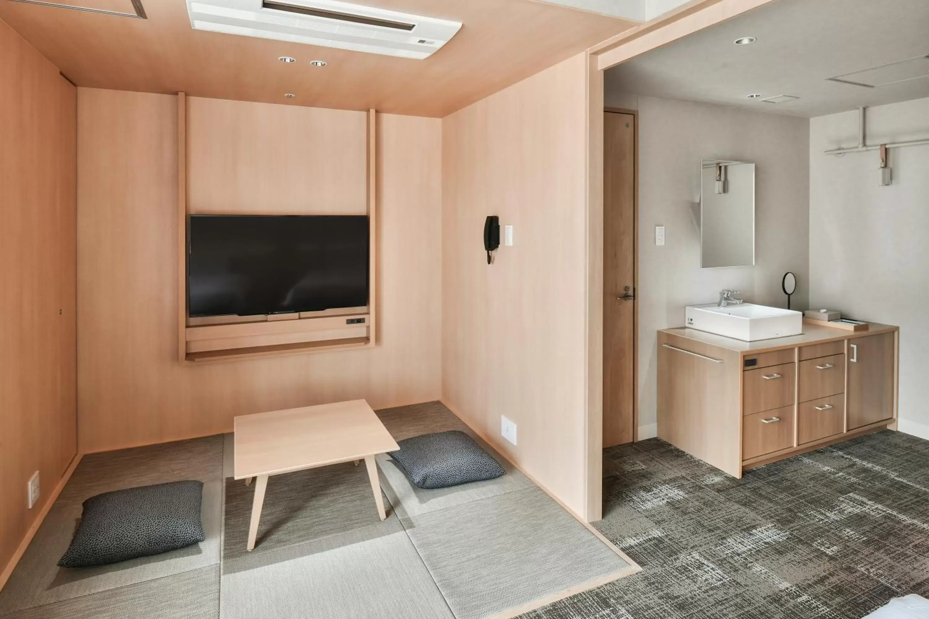 TV/Entertainment Center in REF Matsuyama City Station by VESSEL HOTELS