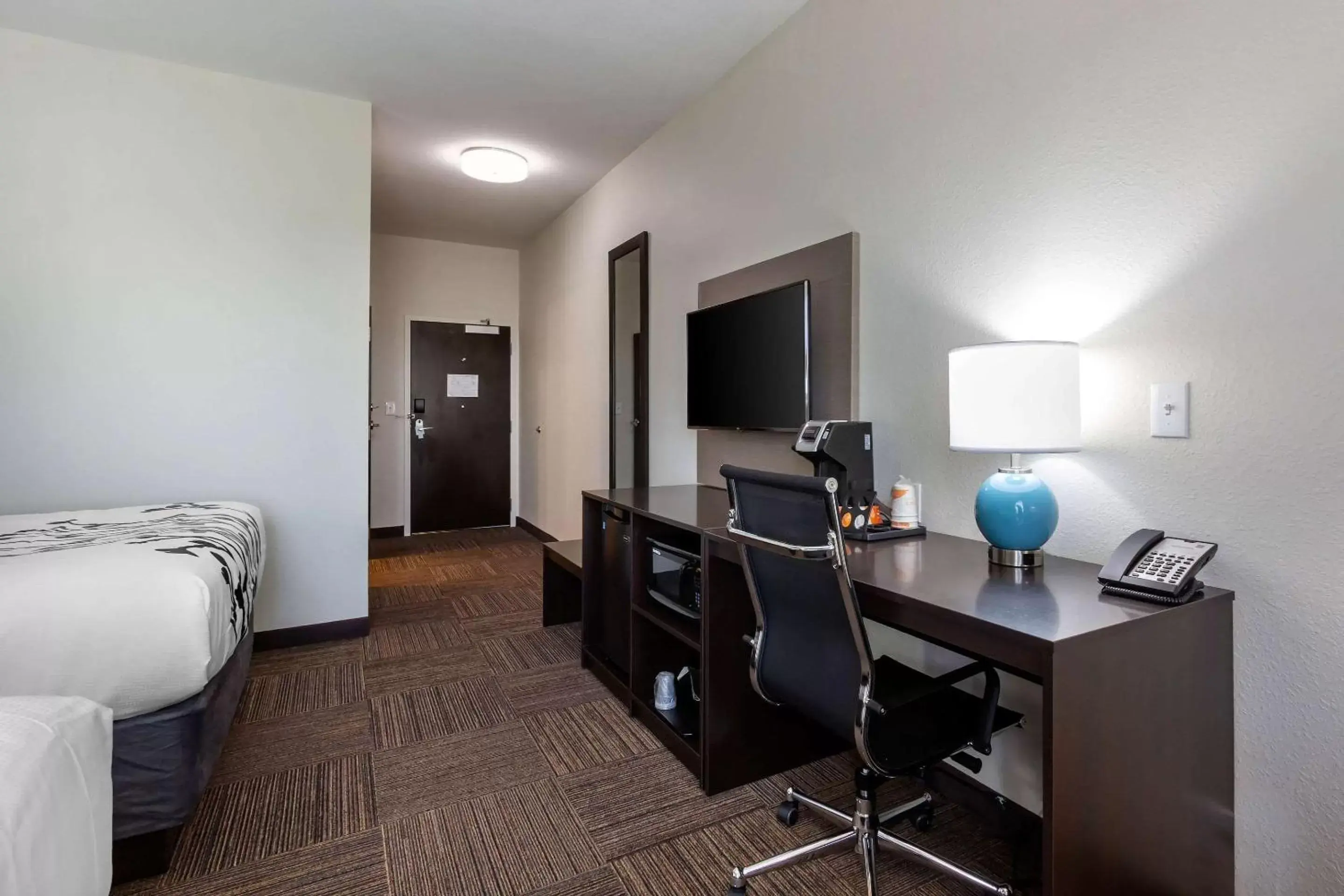 Photo of the whole room, TV/Entertainment Center in Sleep Inn & Suites Tampa South