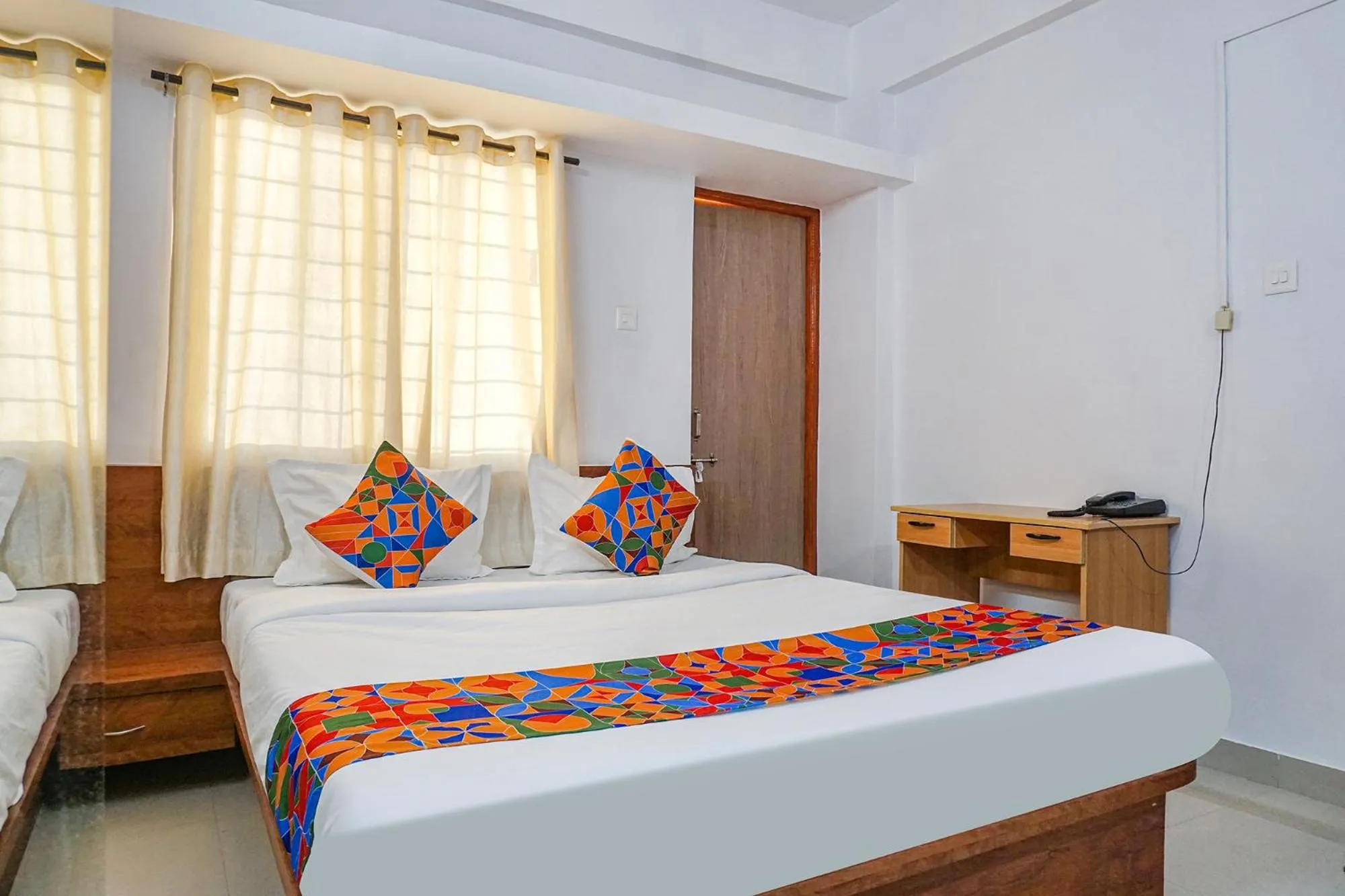 Bed in FabHotel Lake View - Chinmaya Vitthal Mandir