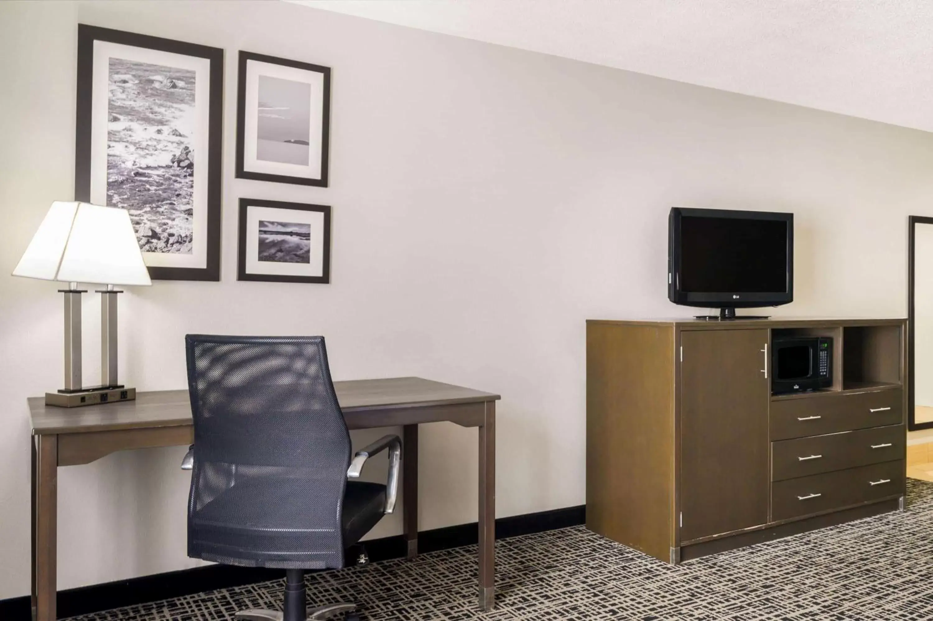 Photo of the whole room, TV/Entertainment Center in La Quinta Inn by Wyndham North Myrtle Beach