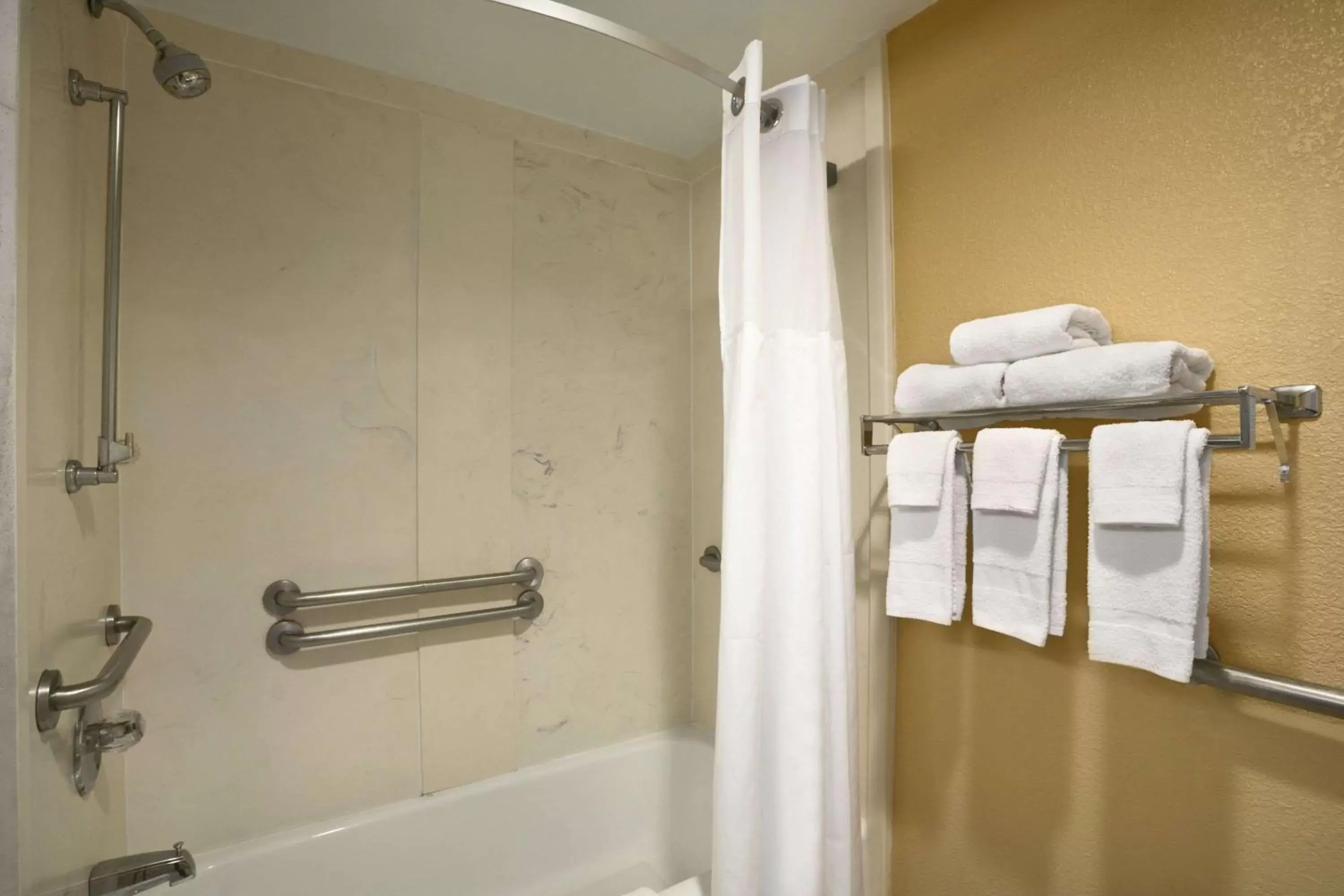 Bathroom in Days Inn by Wyndham Airport Nashville East