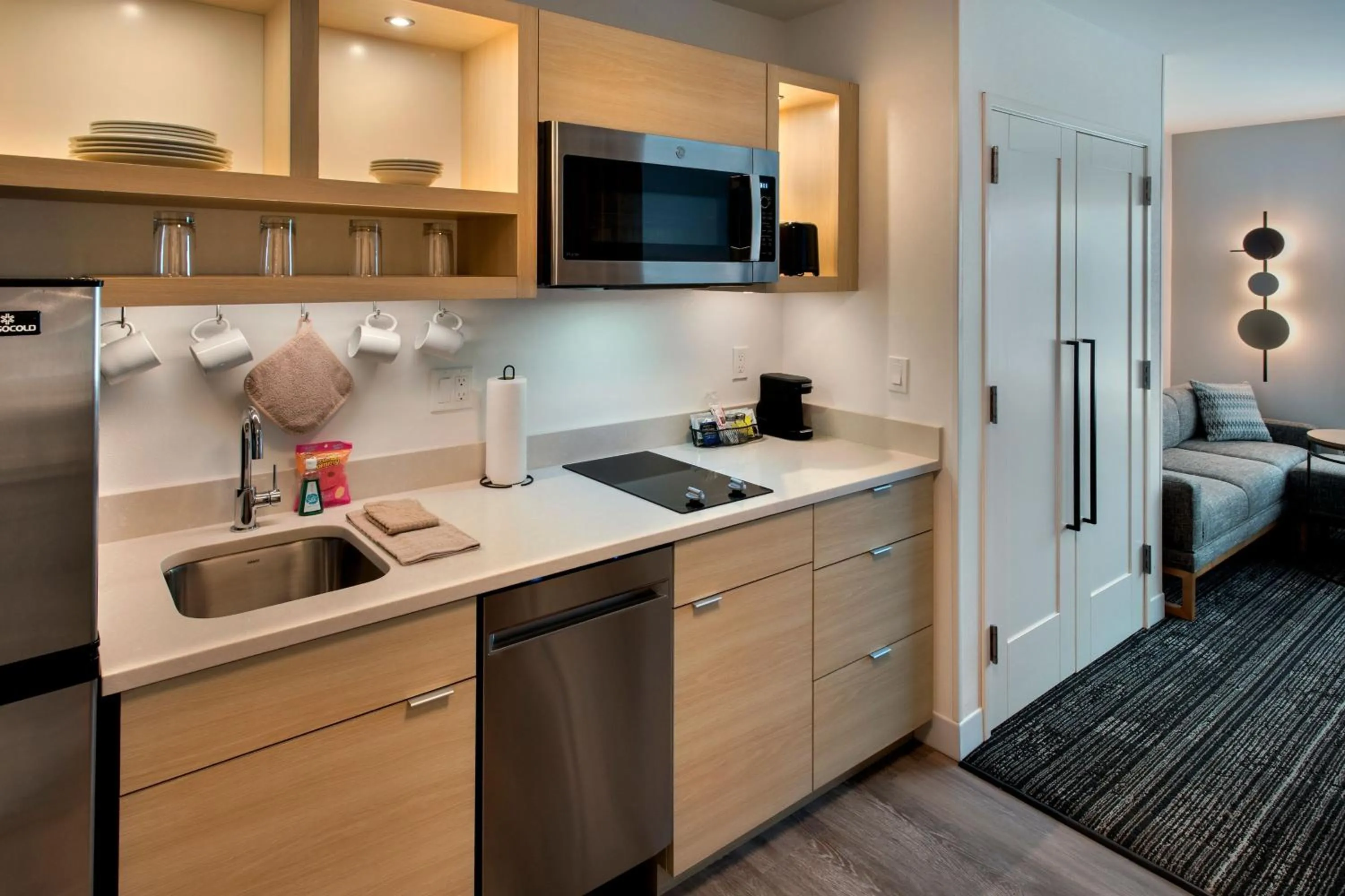 Kitchen or kitchenette, Bed in TownePlace Suites Portland Airport ME