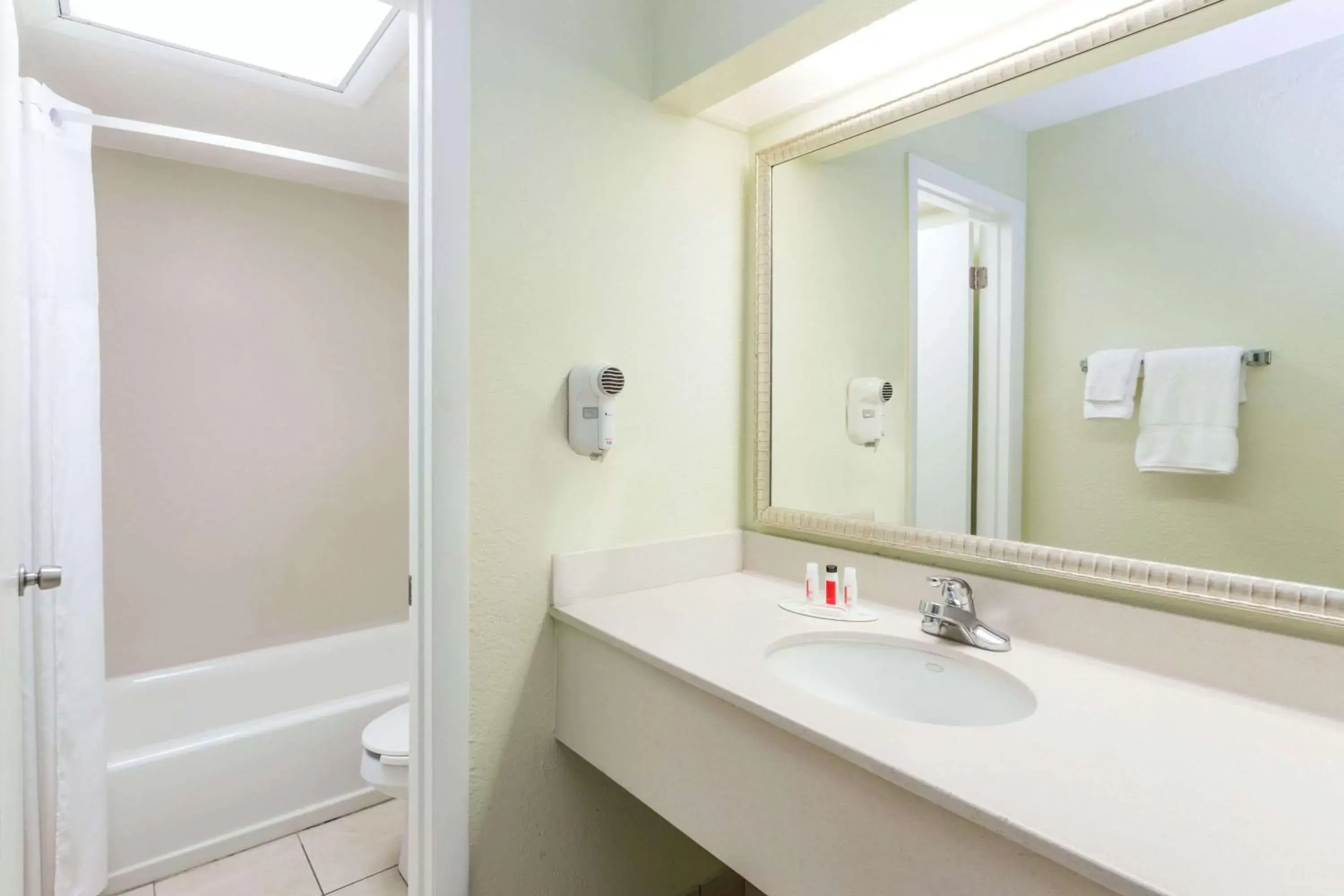 Bathroom in Days Inn by Wyndham Cocoa Beach Port Canaveral