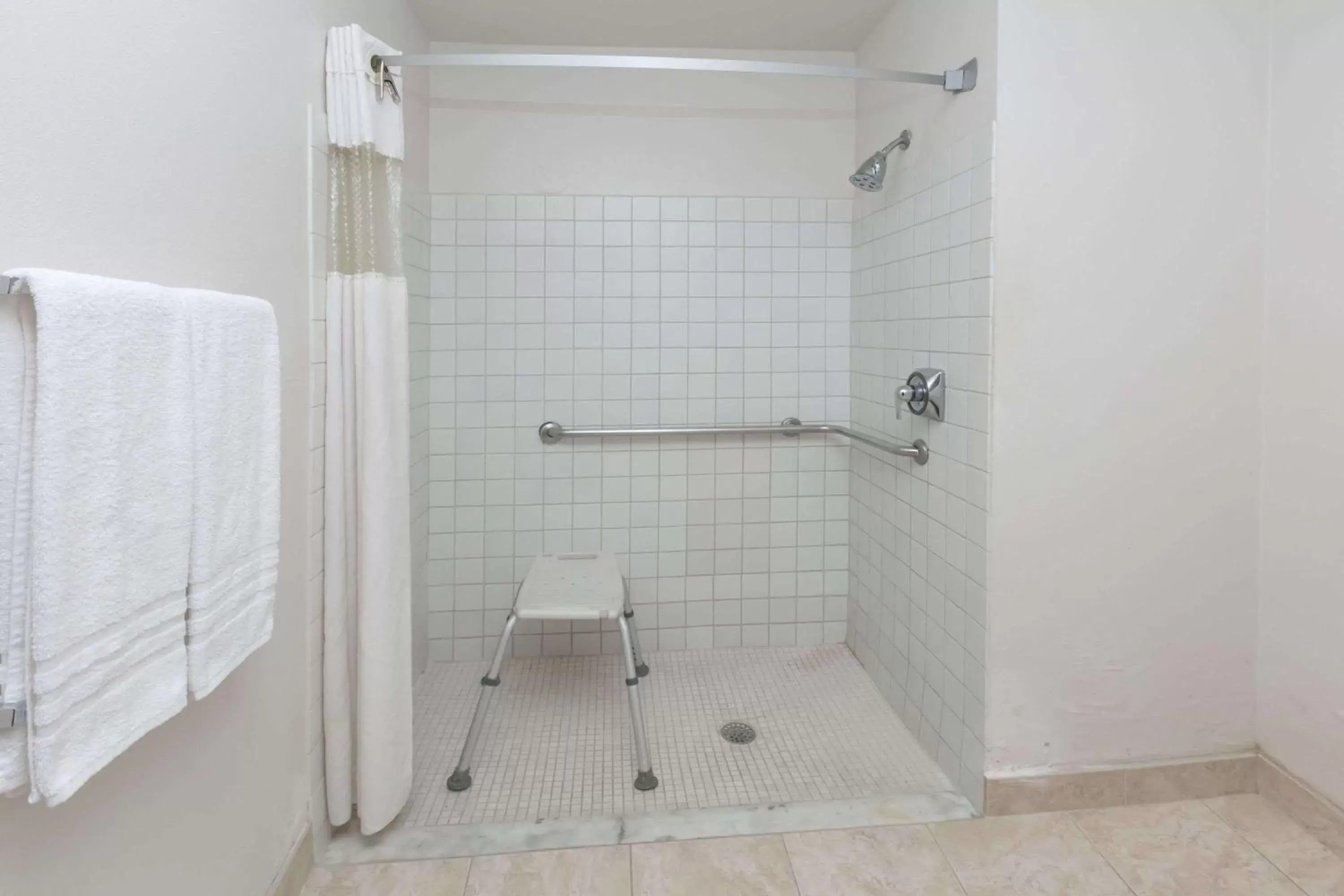 Bathroom in Baymont by Wyndham Arlington At Six Flags Dr