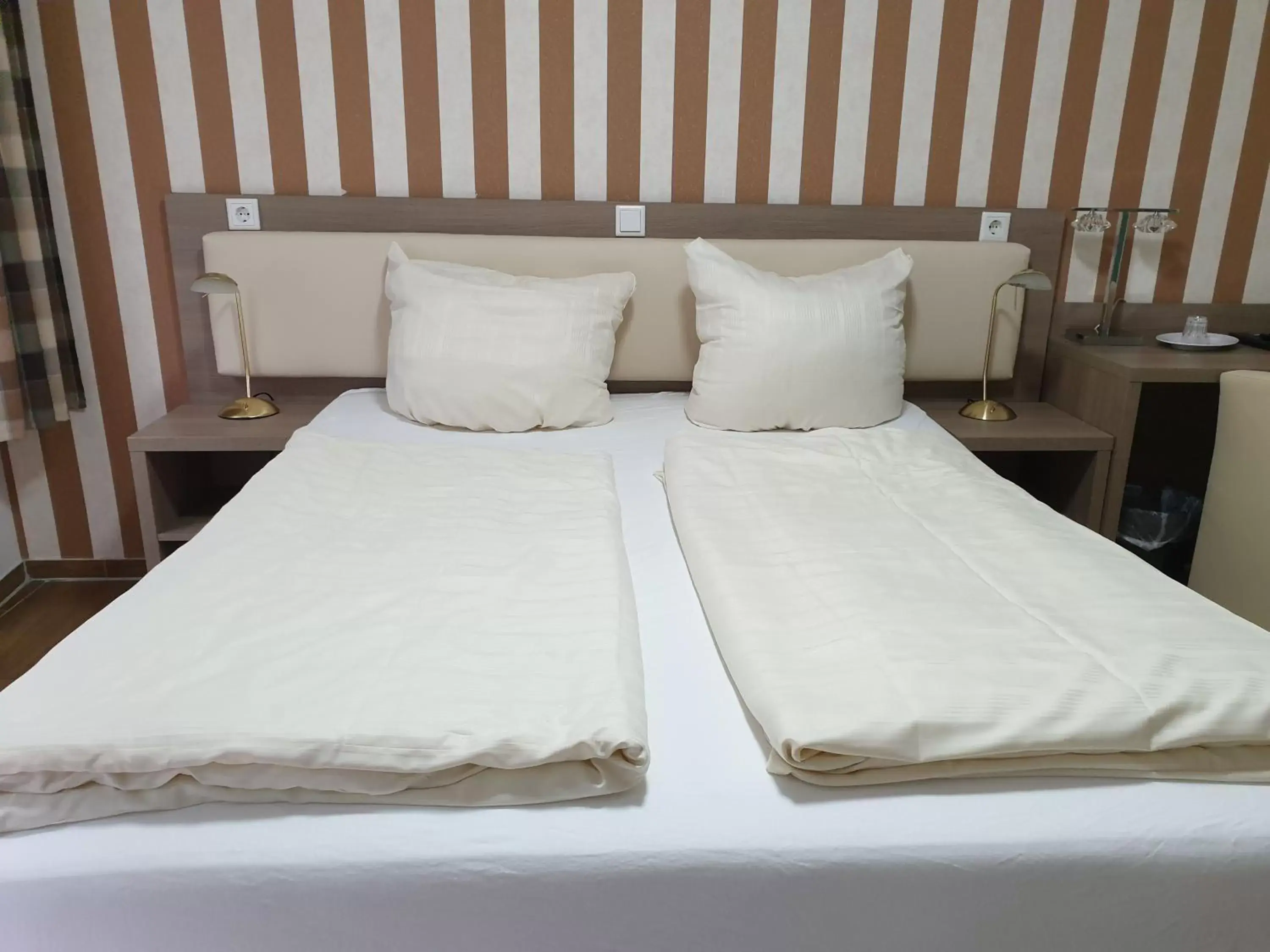 Bed in Cityhotel Ahlen Garni