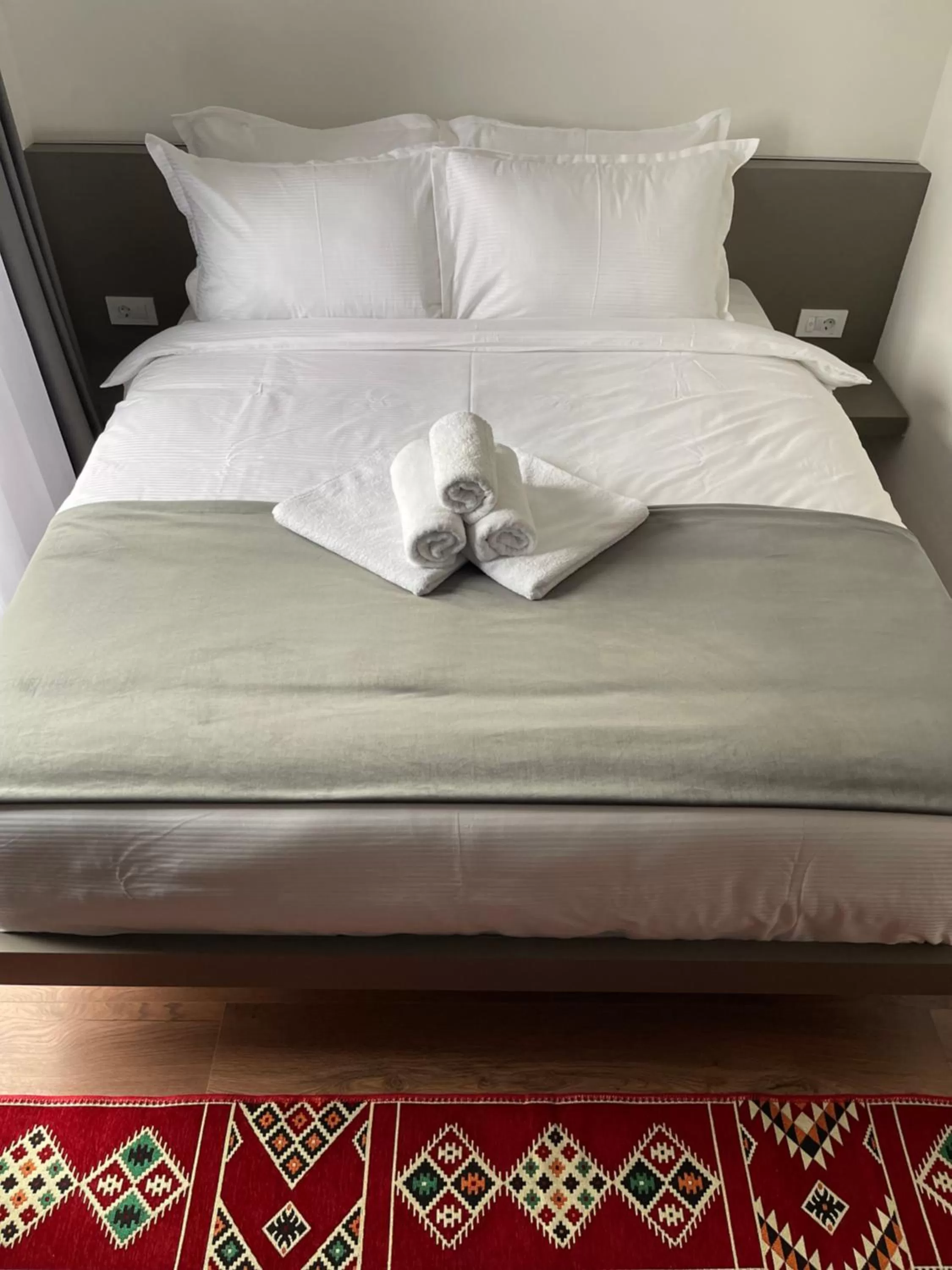 Bed in Etnomania Boutique Hotel