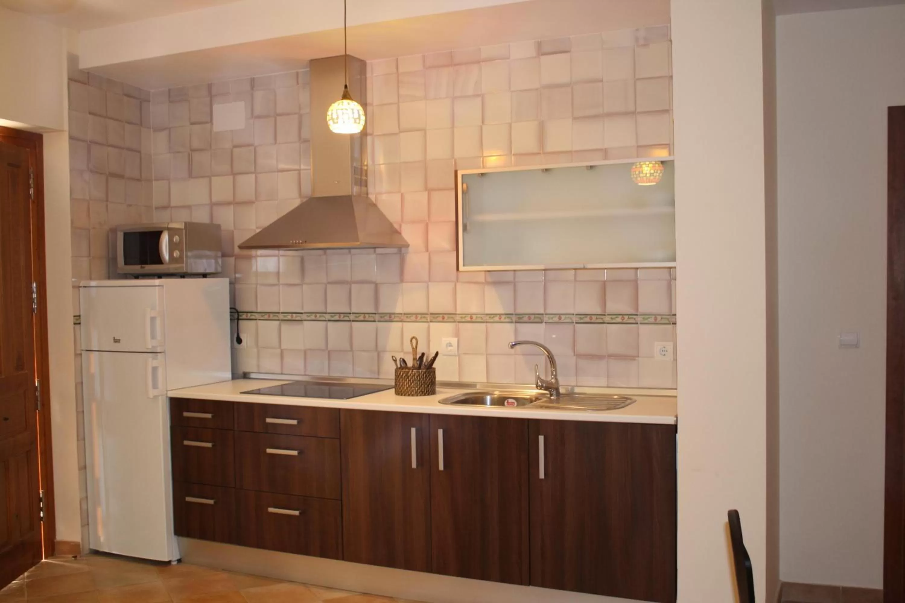 Kitchen or kitchenette in Abadia Suites