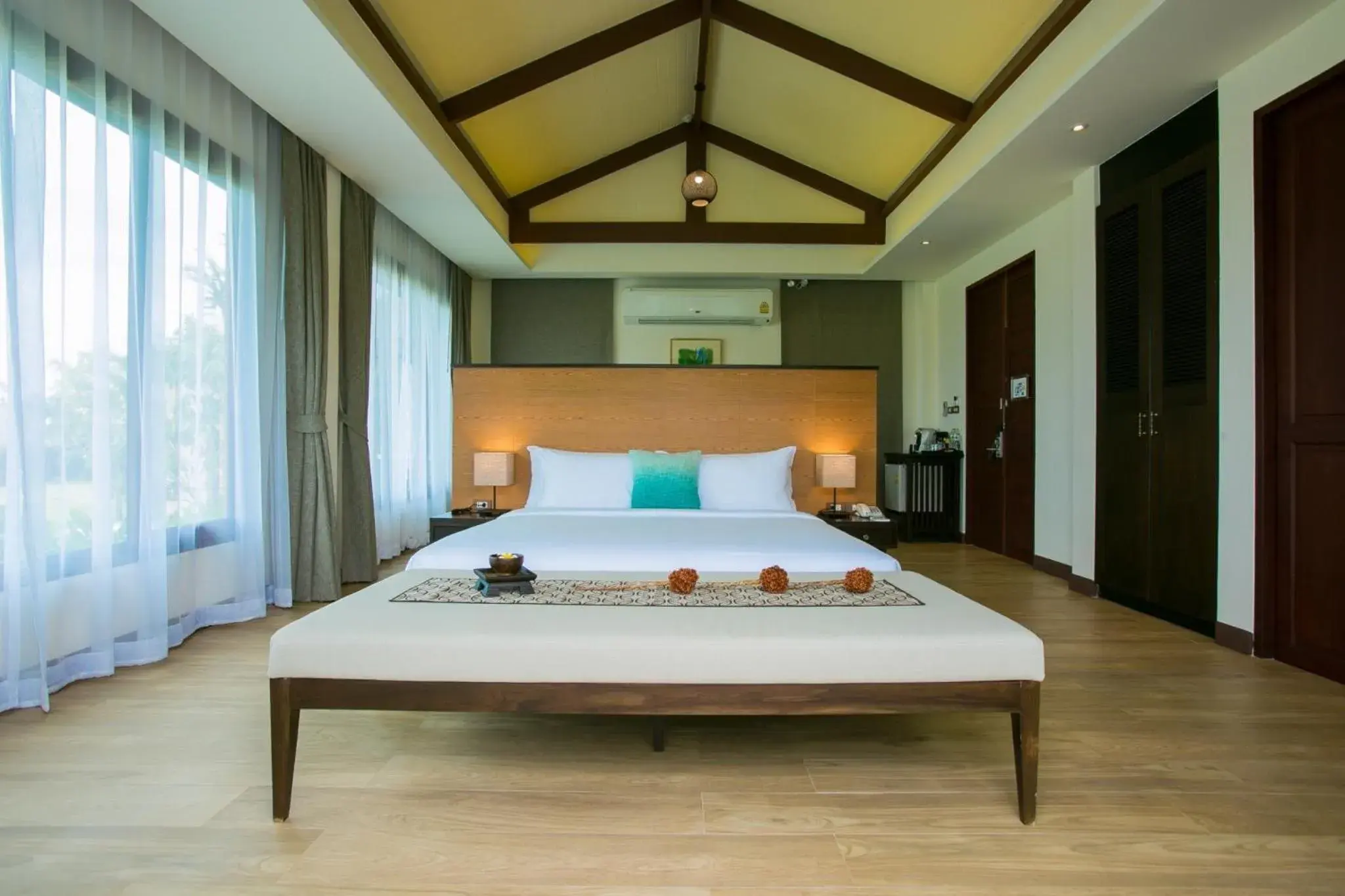 Bed in Triple Tree Beach Resort