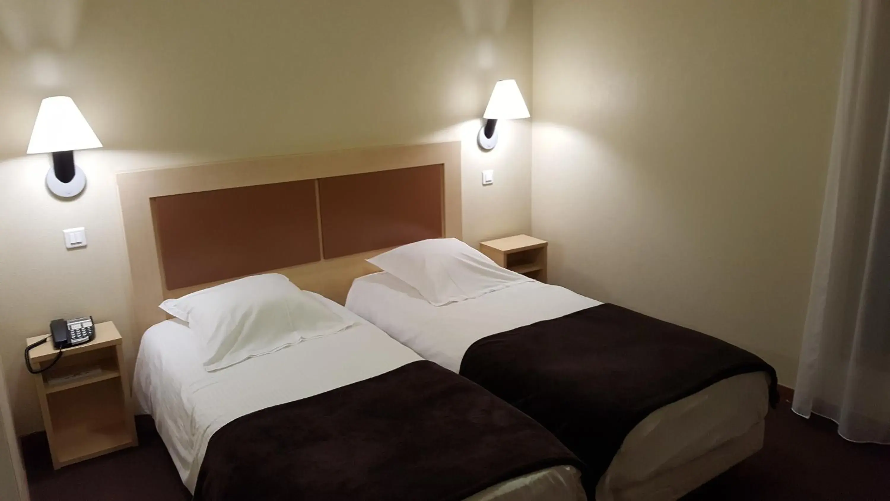 Bed in Hotel Talencia