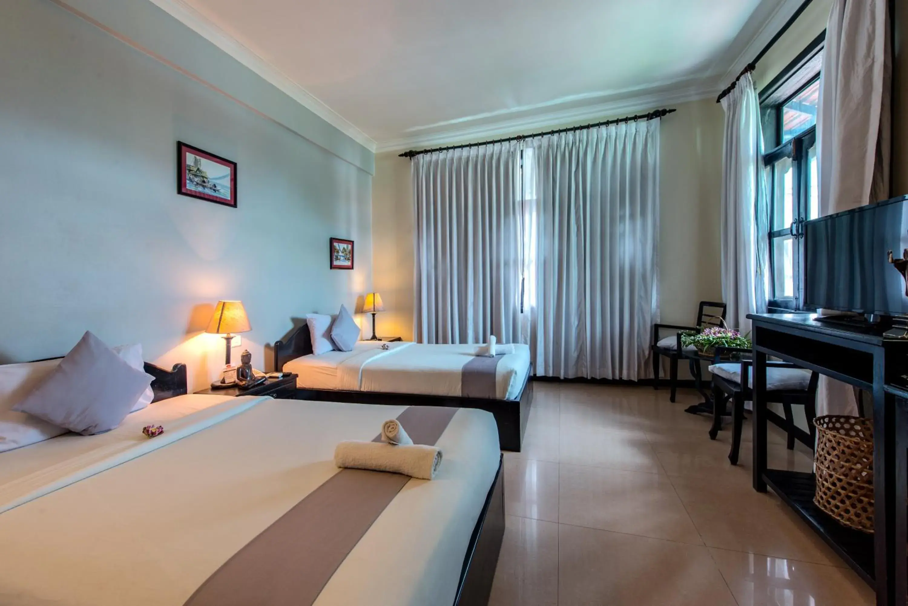 Photo of the whole room, Bed in Angkor Panoramic Boutique Hotel