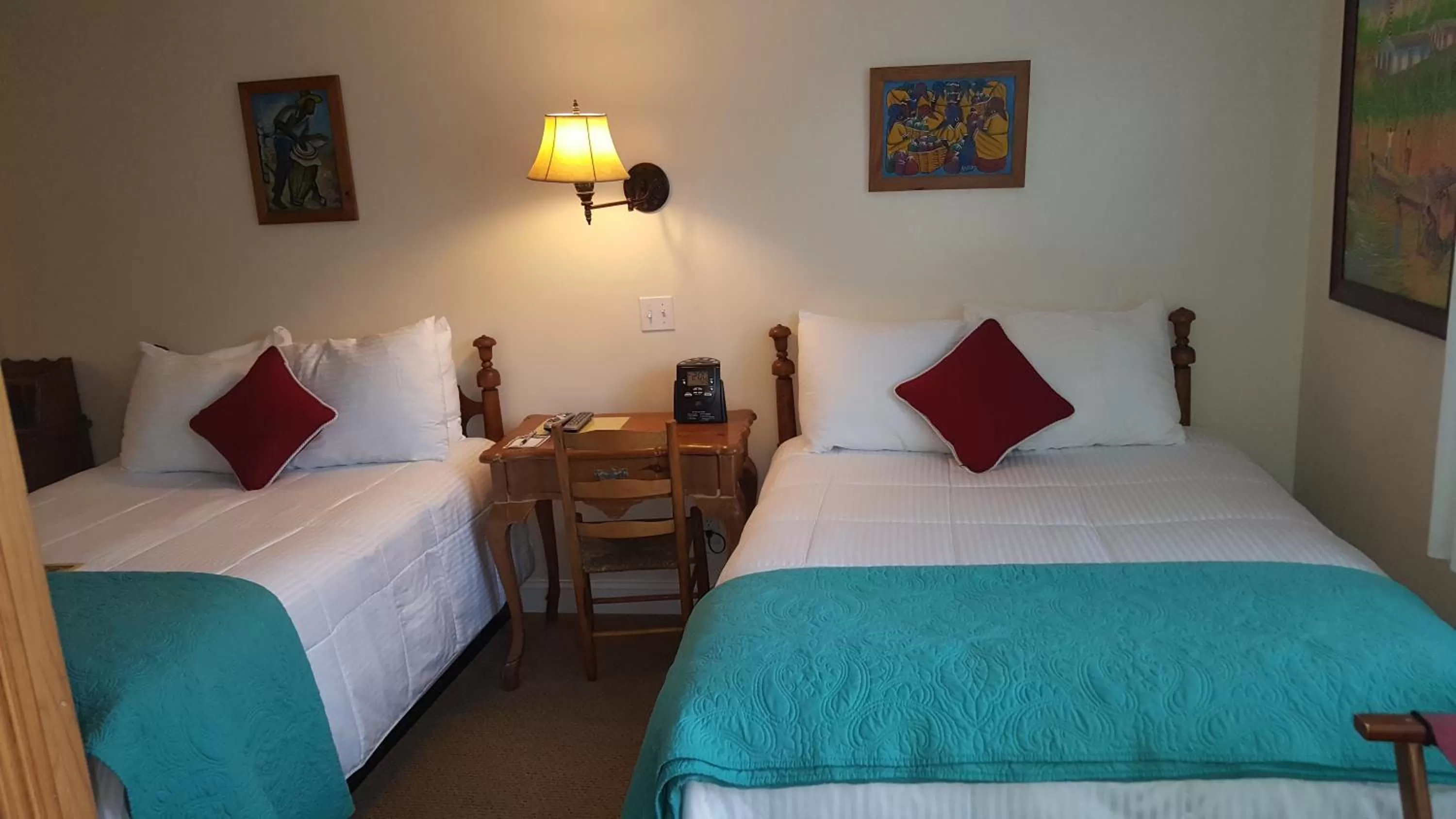 Bedroom, Bed in The Caribbean Court Boutique Hotel