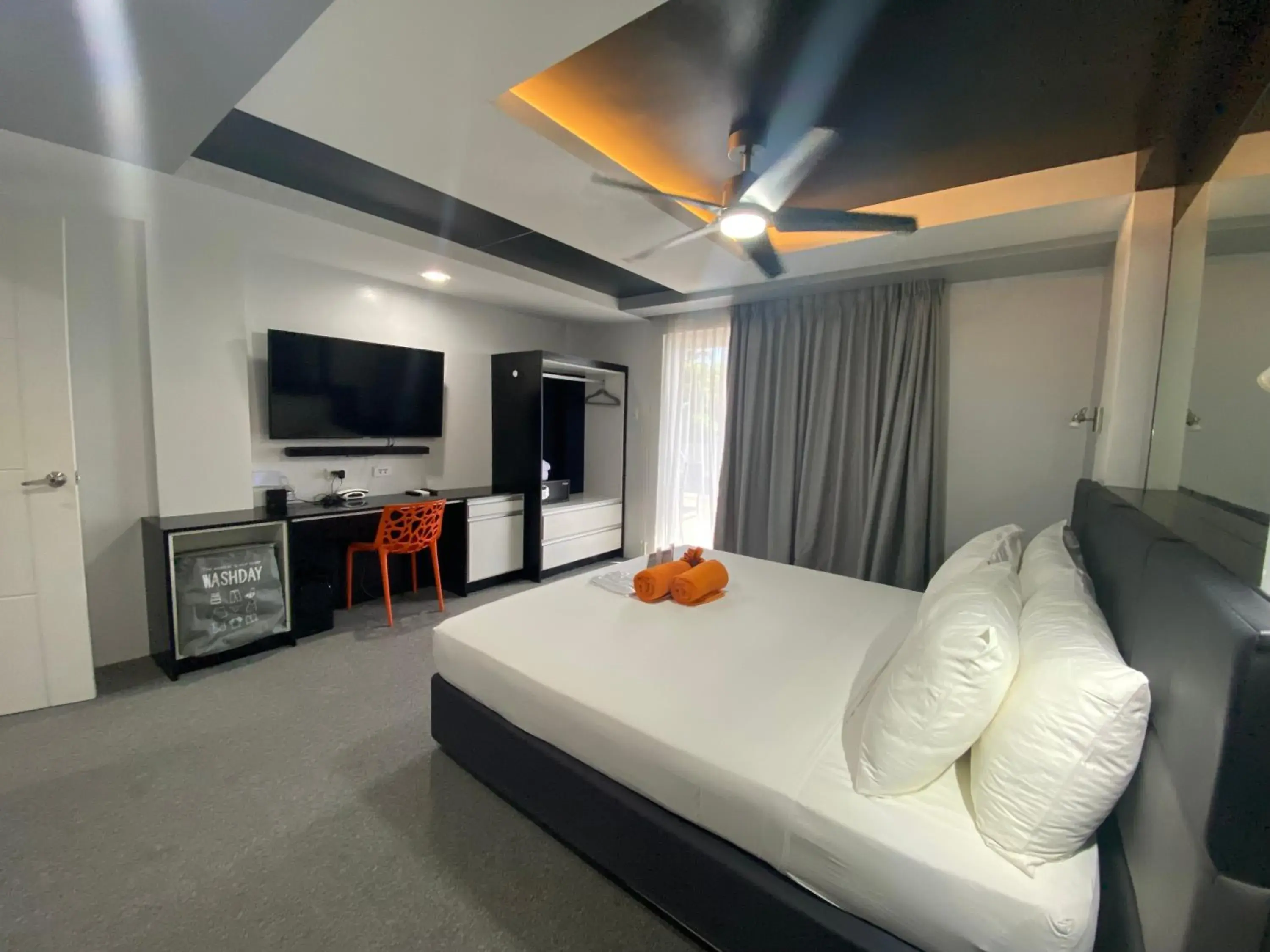 Bedroom, TV/Entertainment Center in Lalaguna Villas Luxury Dive Resort and Spa