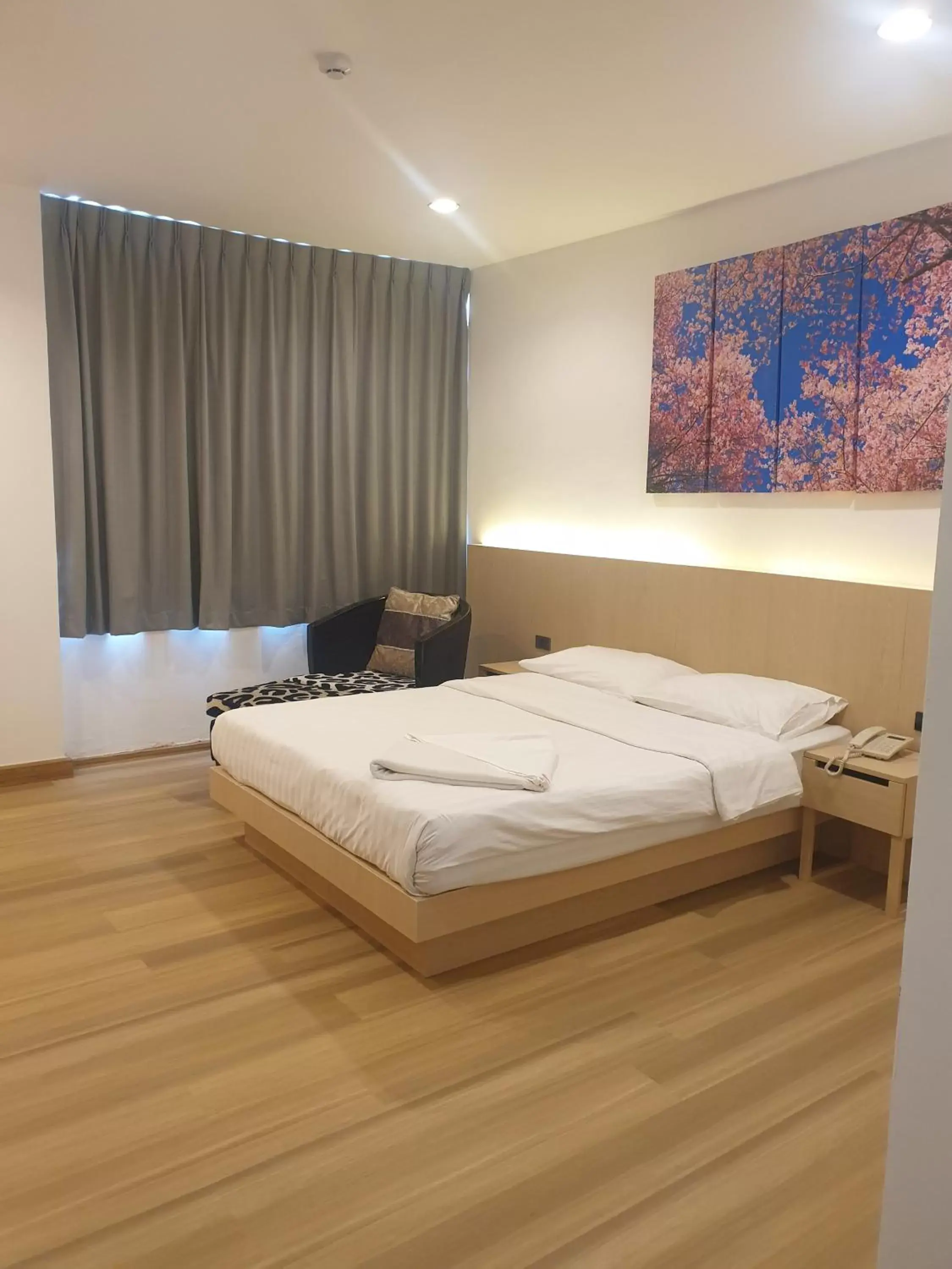 Bed in Sakura Sky Residence