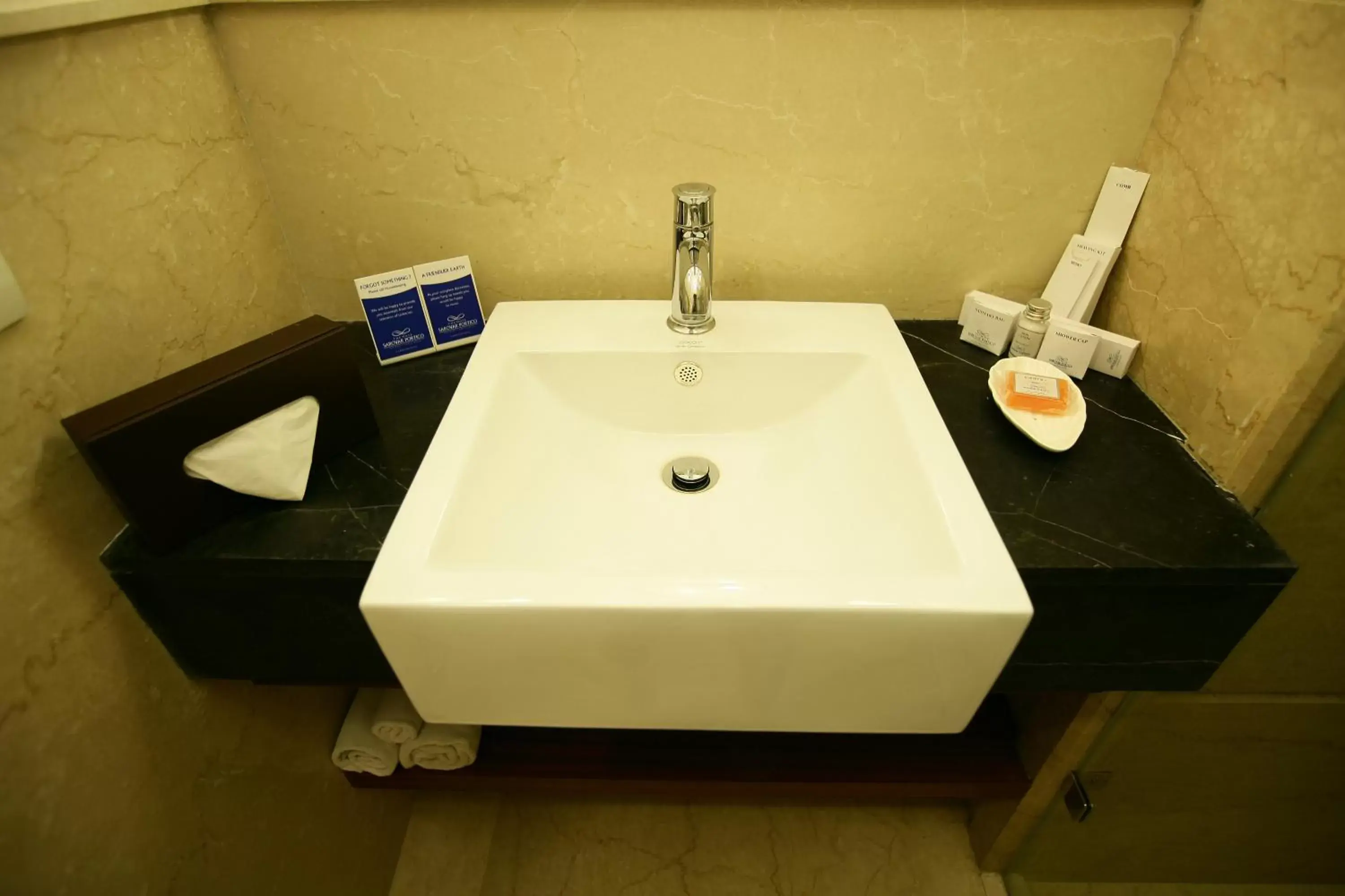 Bathroom in Muse Sarovar Portico Nehru Place