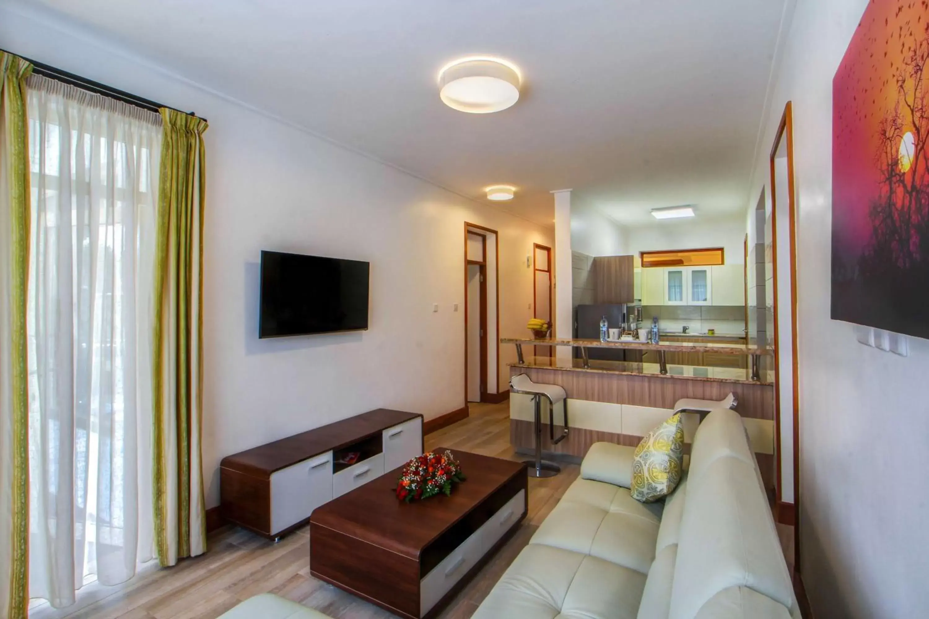 TV and multimedia, Seating Area in Executive Residency by Best Western Nairobi