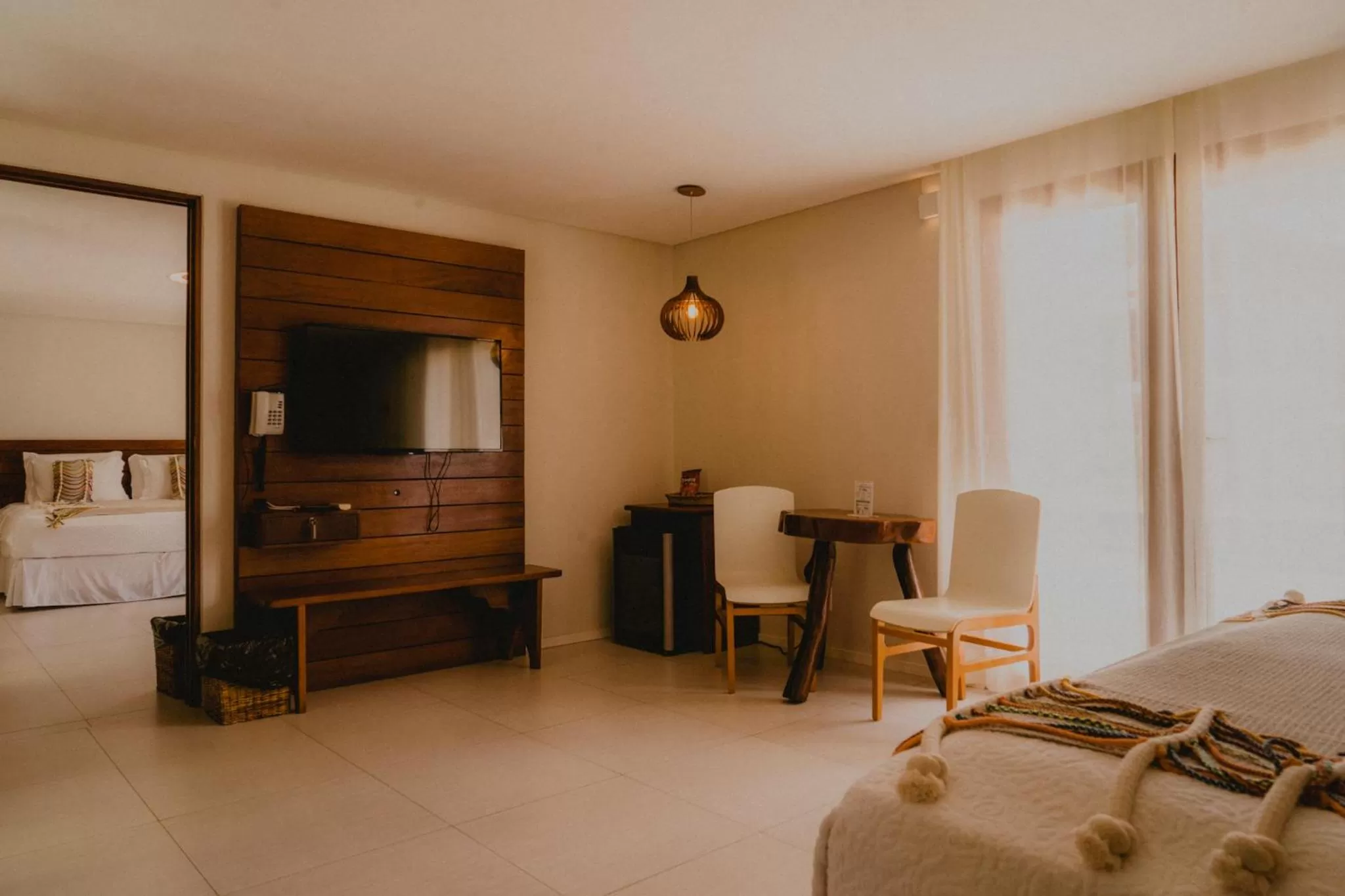 Living room, Bed in Pousada Rangai