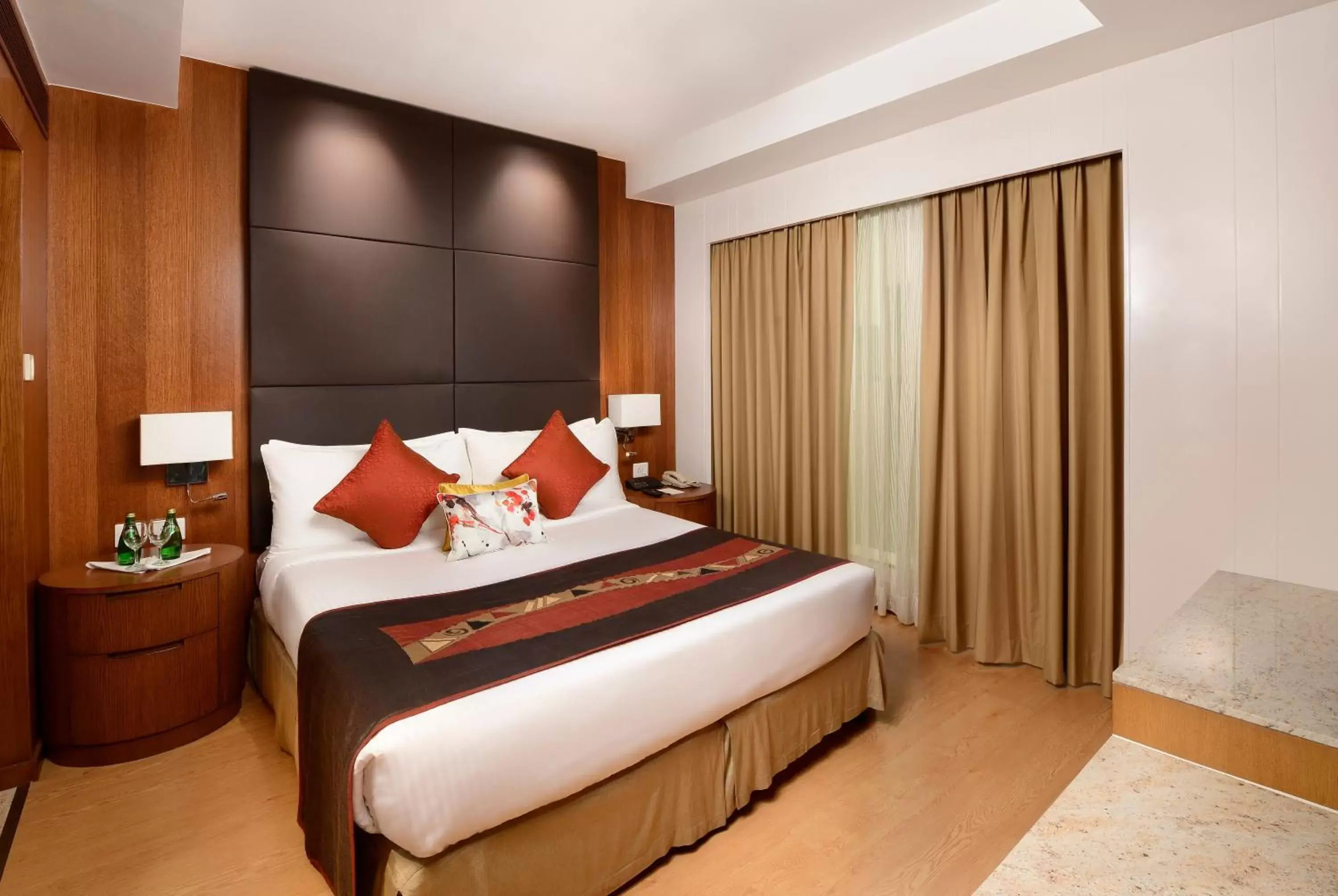 Bed in Svelte Hotel and Personal Suites