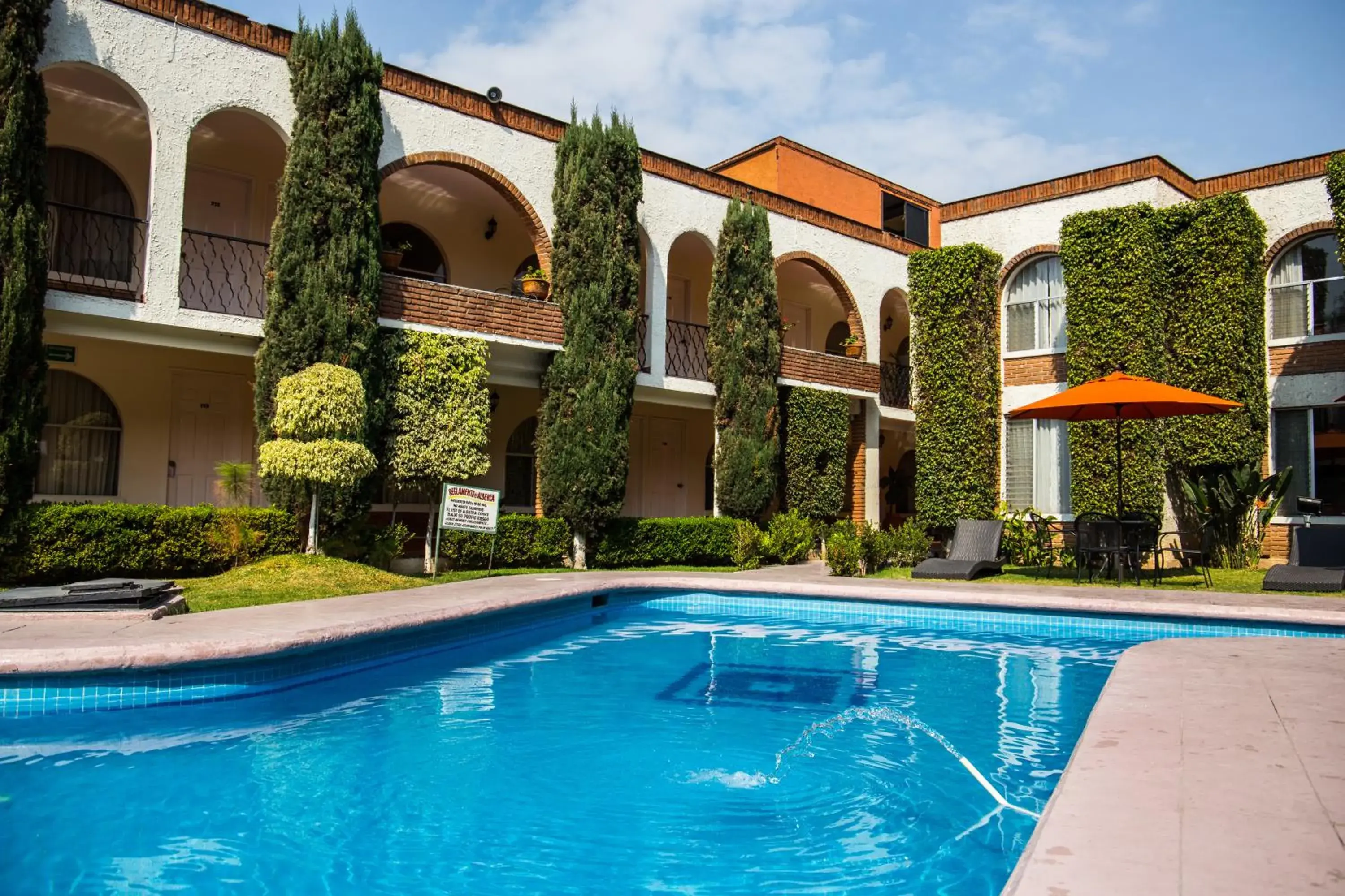 Swimming Pool in Hotel & Suites Villa del Sol