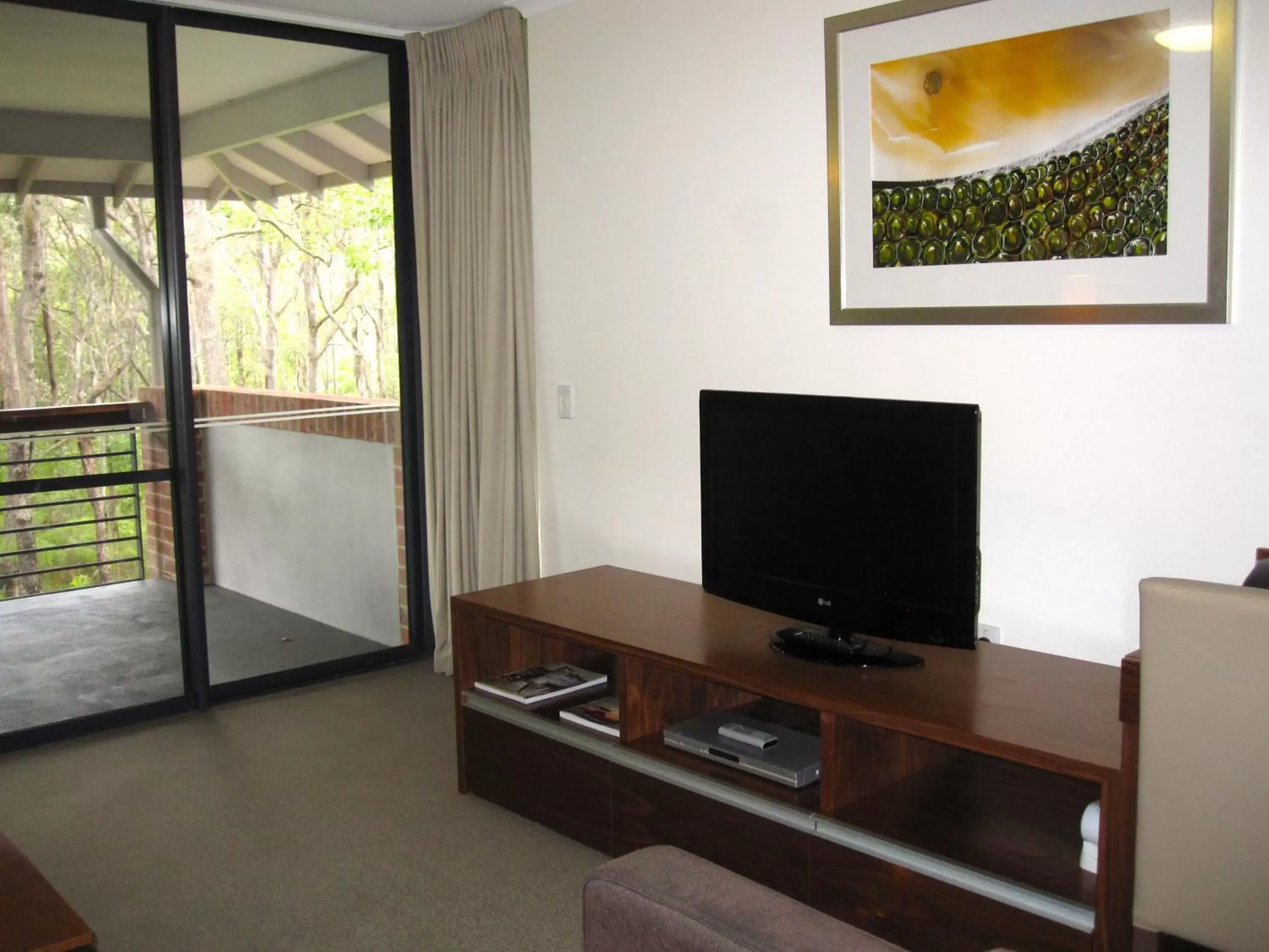 TV and multimedia, TV/Entertainment Center in Darby Park Serviced Residences