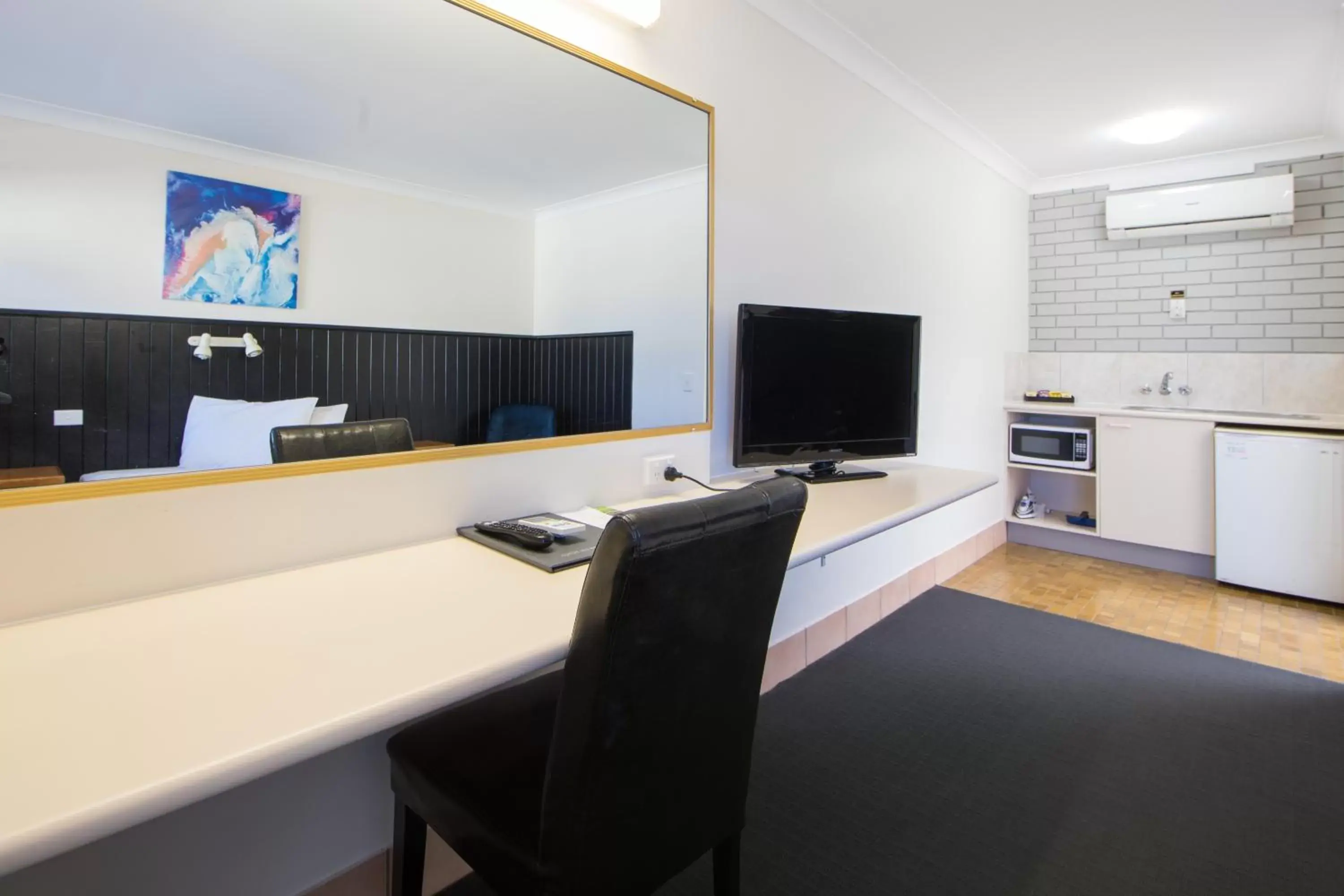 Photo of the whole room, TV/Entertainment Center in Caboolture Motel