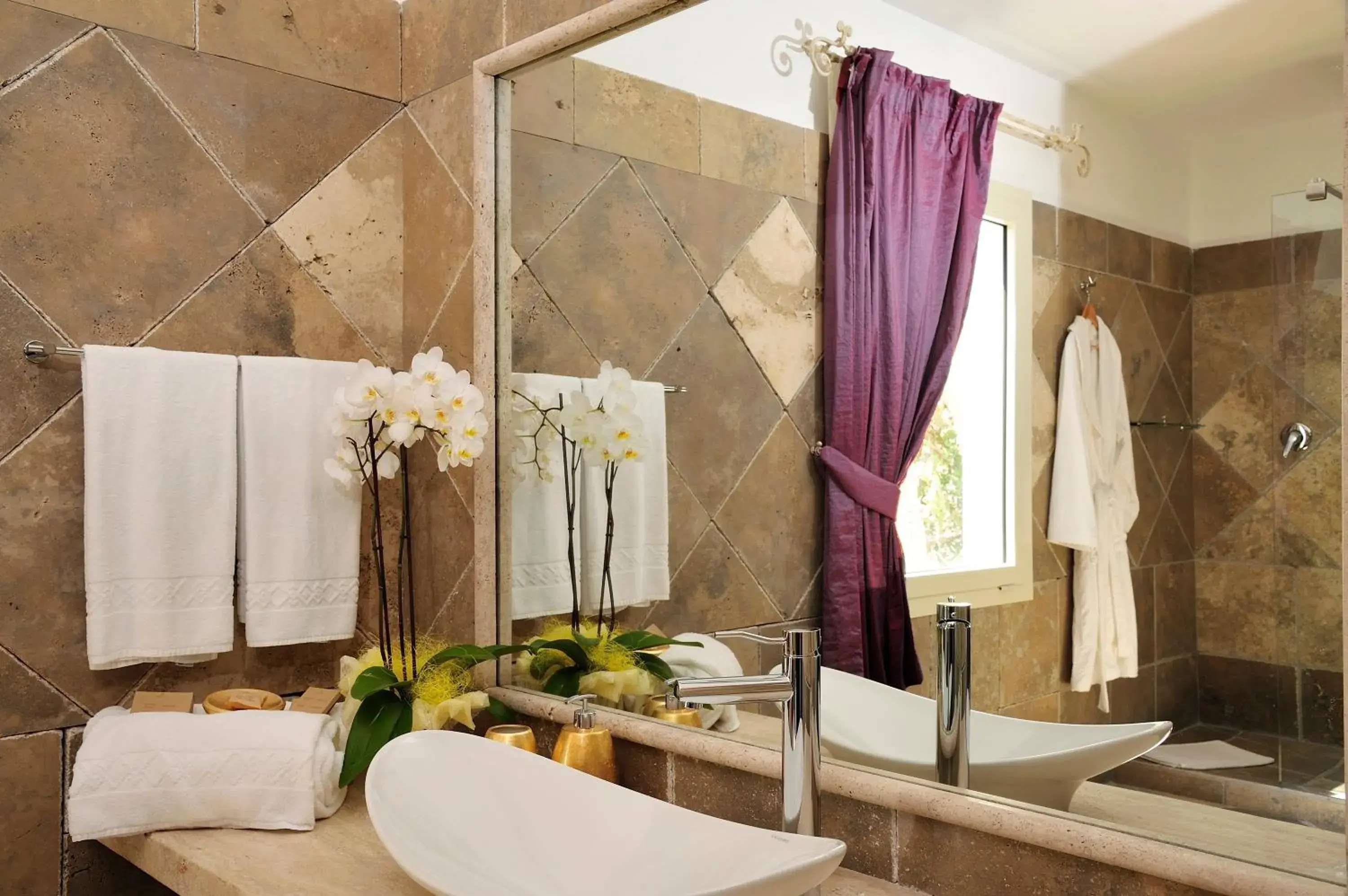 Bathroom in Arbatax Park Resort - Suites Del Mare