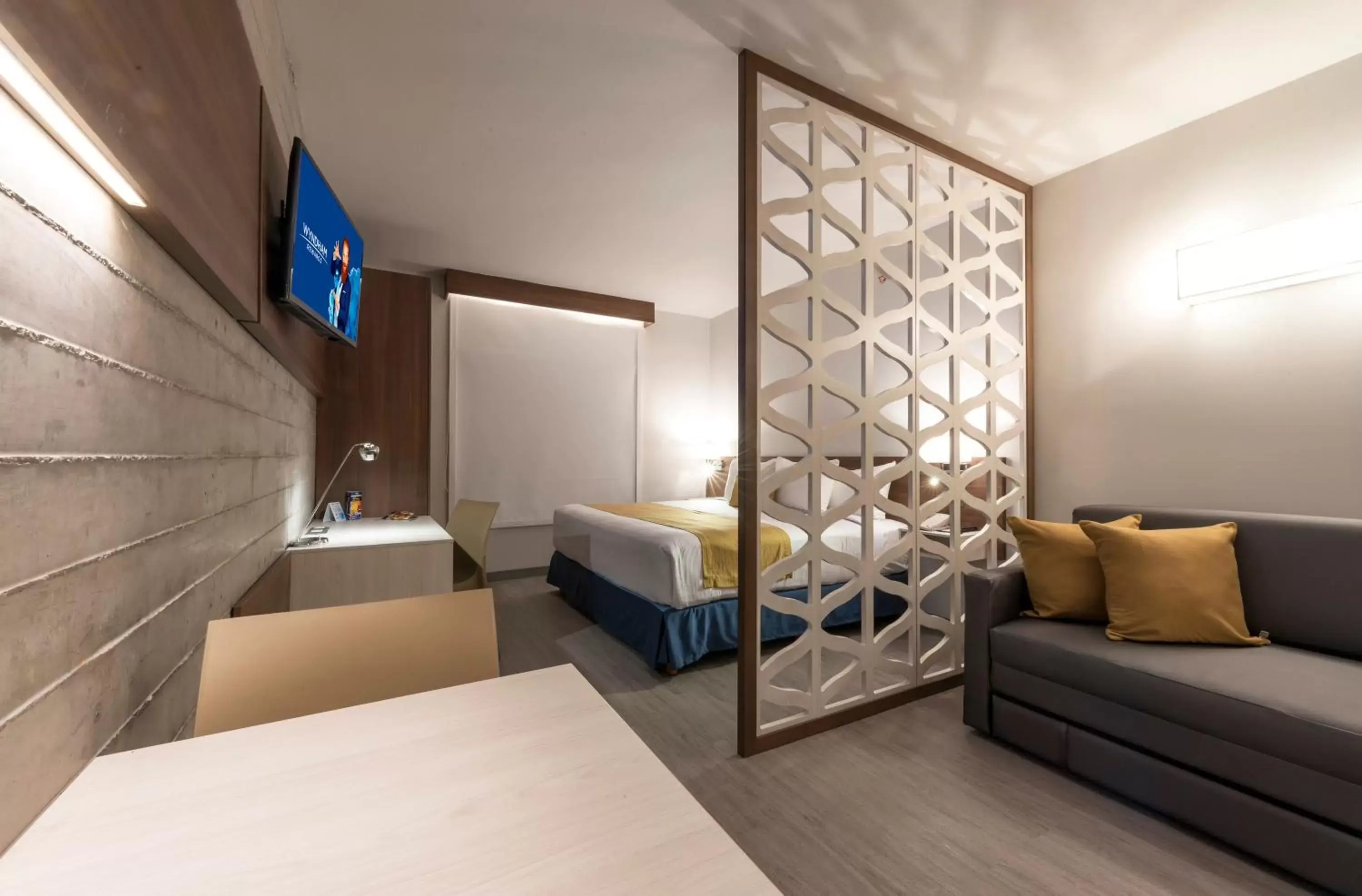 Bed, Seating Area in Microtel Inn & Suites by Wyndham Irapuato