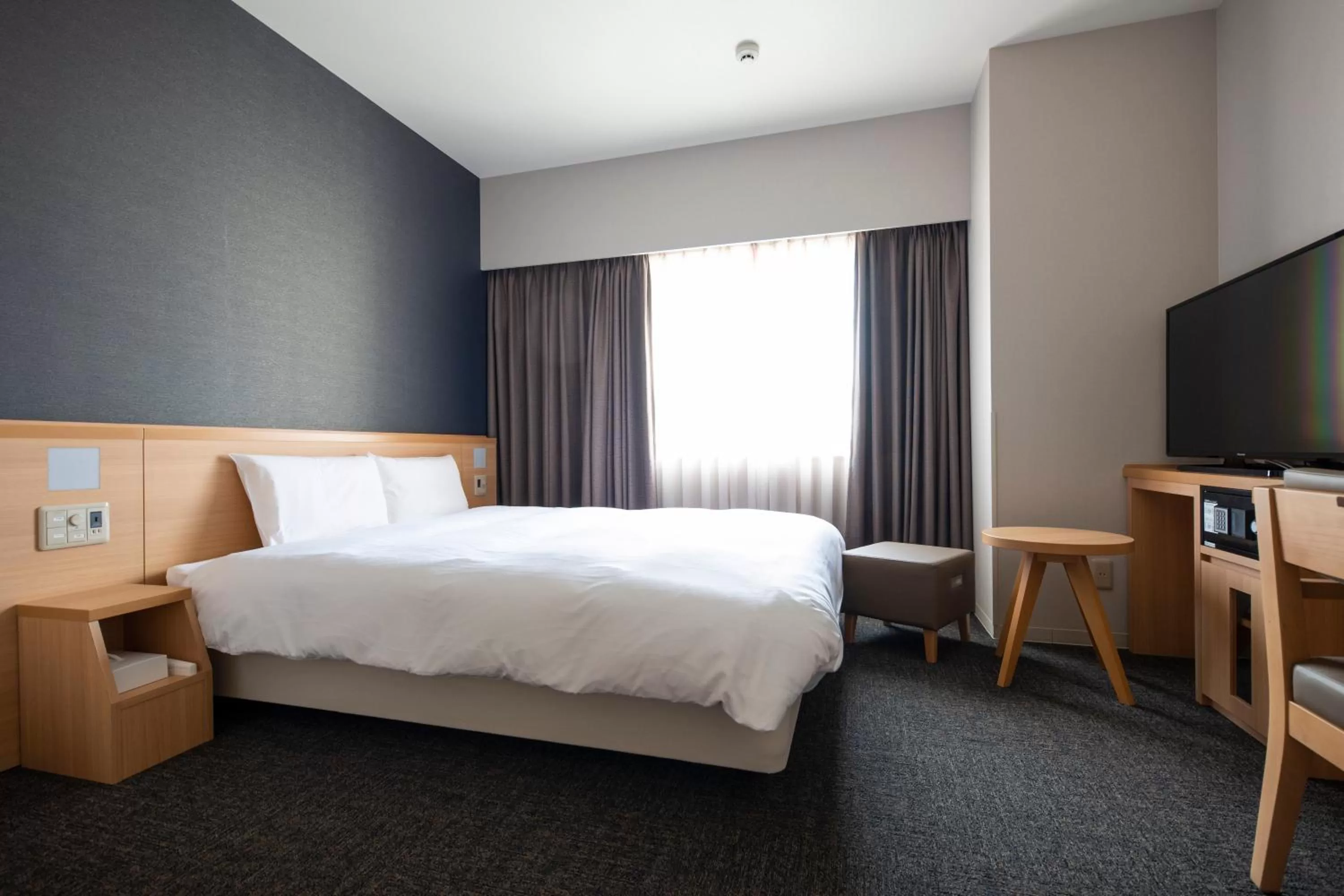 Bed in Dormy Inn Premium Nagasaki Ekimae