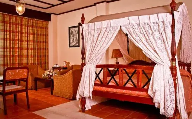 Bed in Grand Oriental Hotel