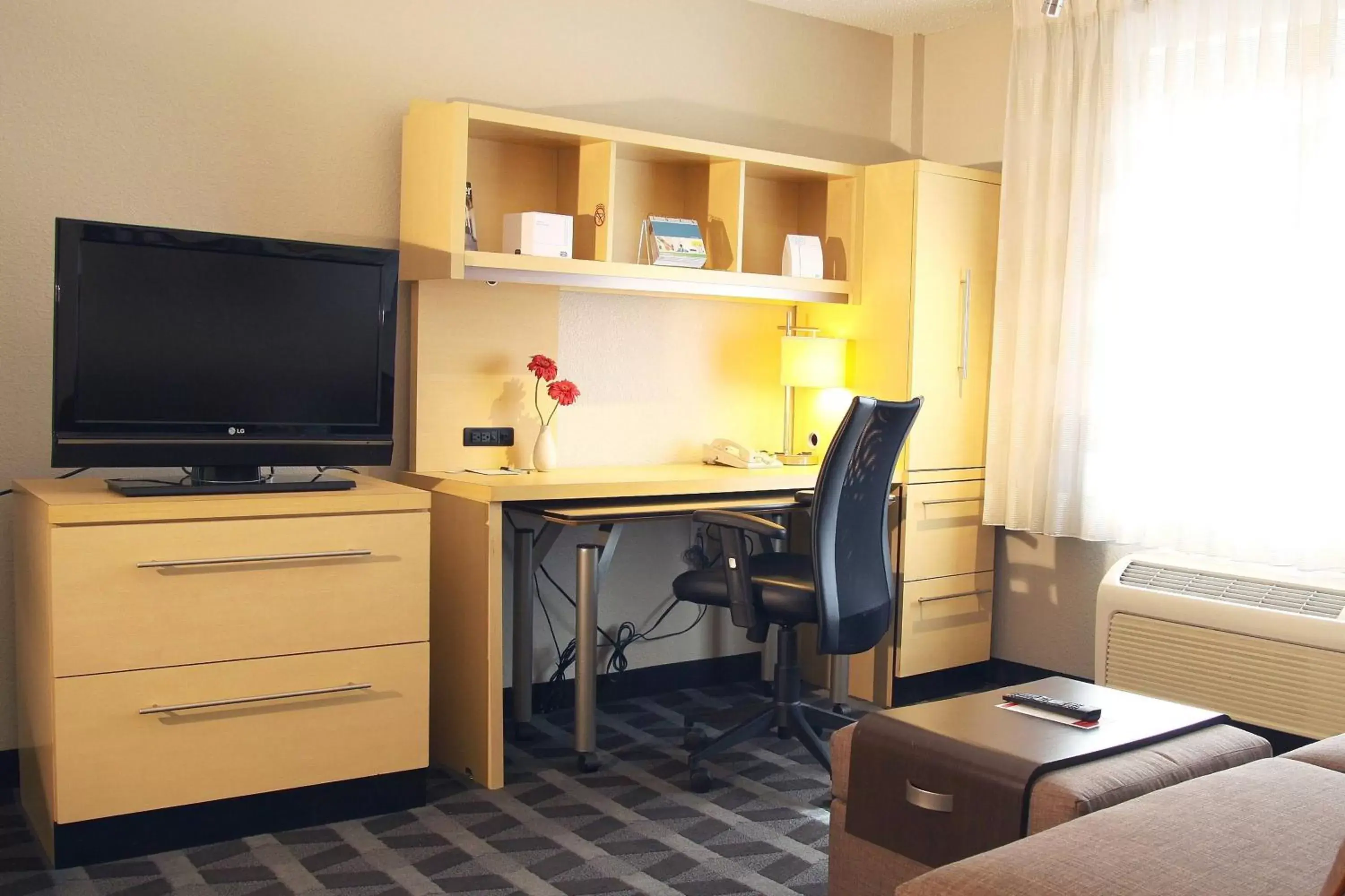 Photo of the whole room, TV/Entertainment Center in TownePlace Suites by Marriott Albany Downtown/Medical Center