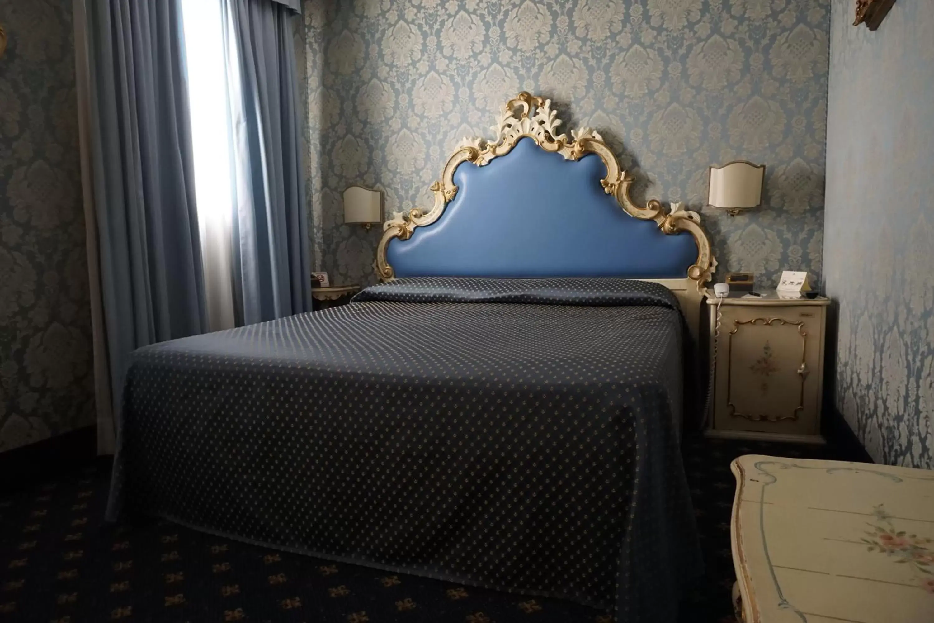 Bed in Hotel Rialto