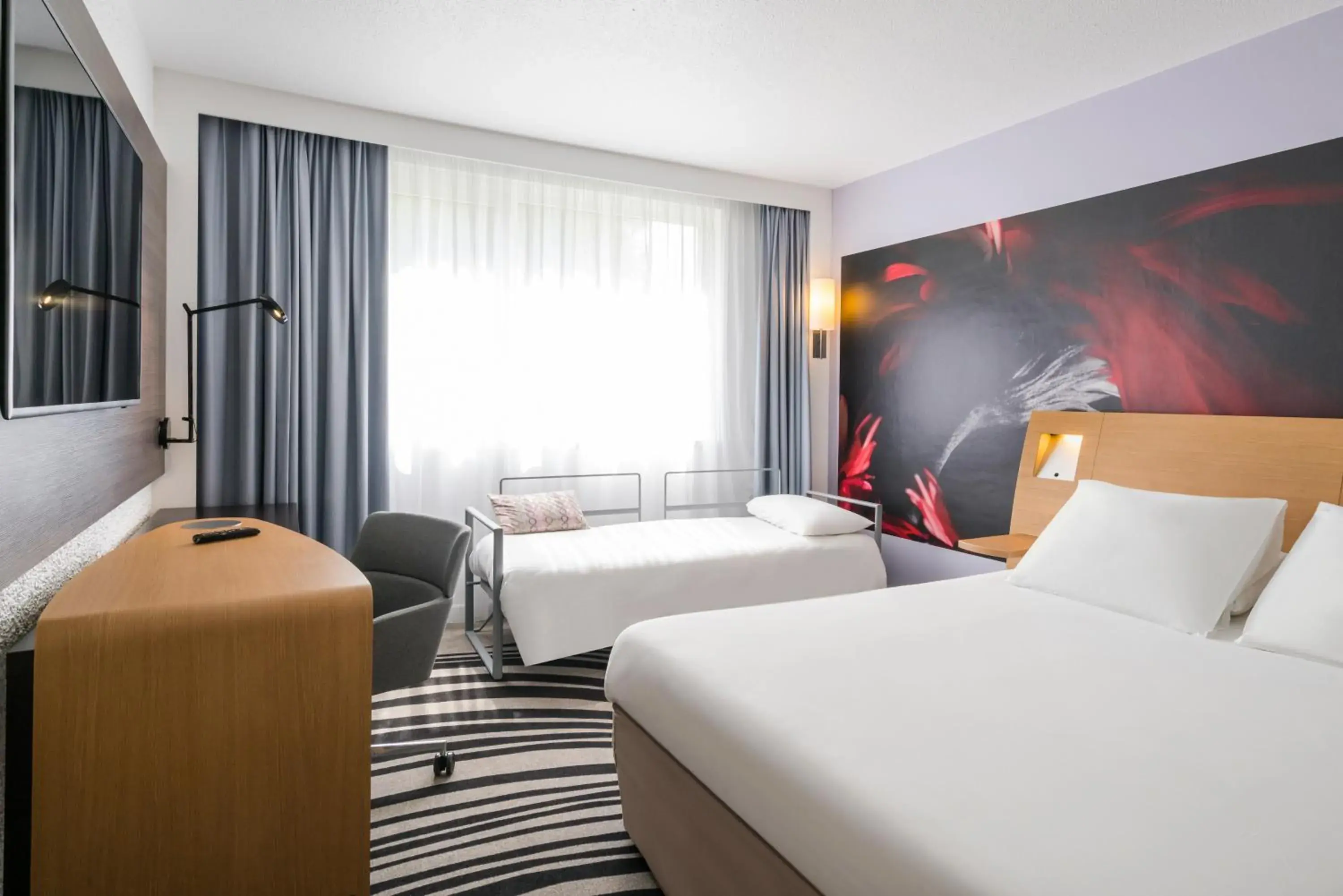 Photo of the whole room, Bed in Novotel Paris Saclay