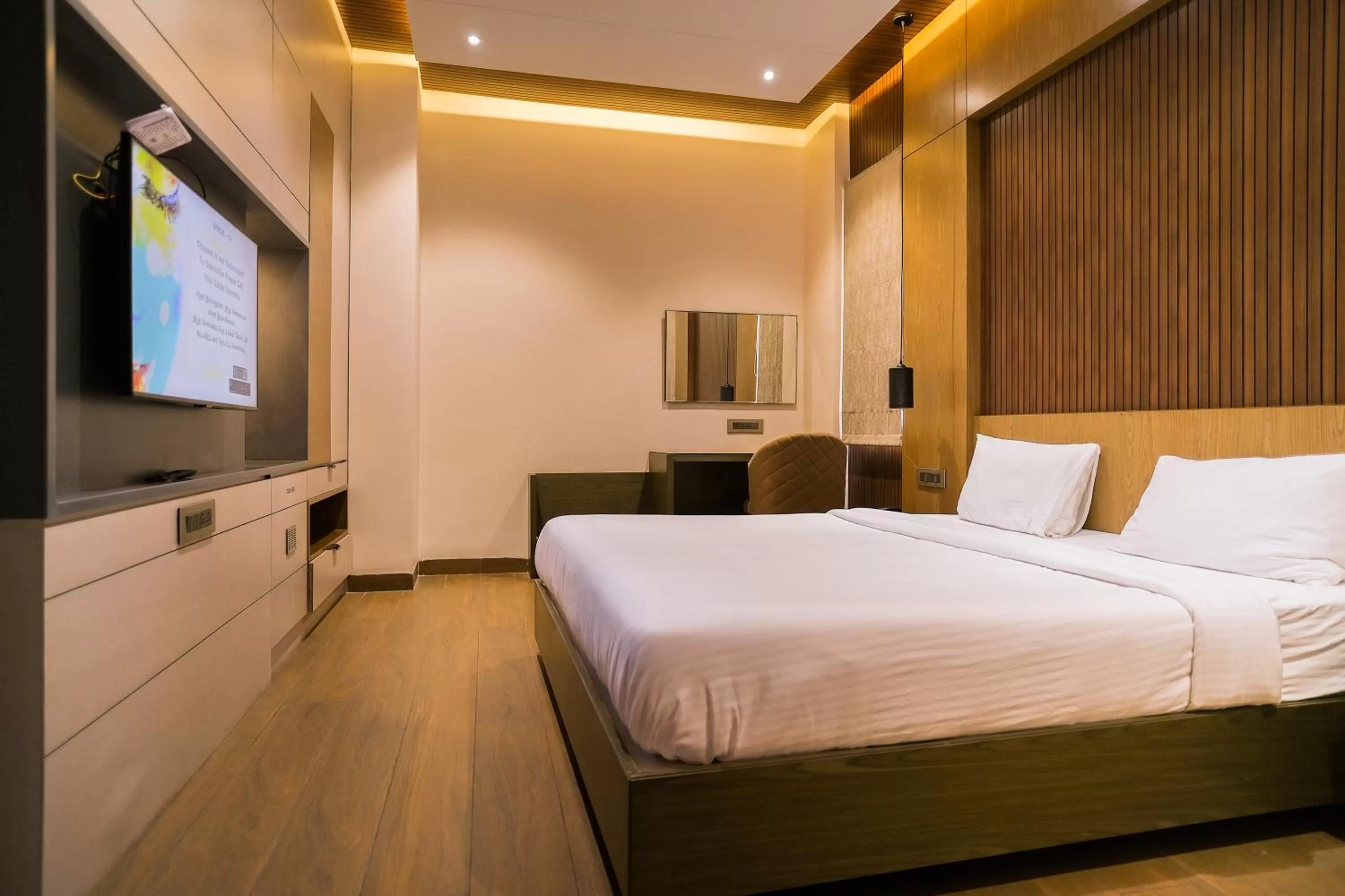 wardrobe, Bed in Symphony Inn