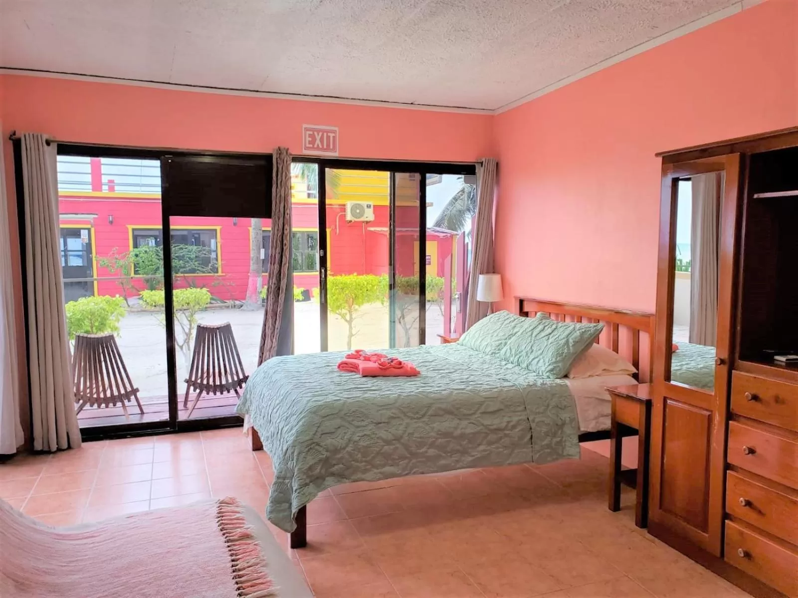 Bed in Beach Side Condos Caye Caulker by CCVH