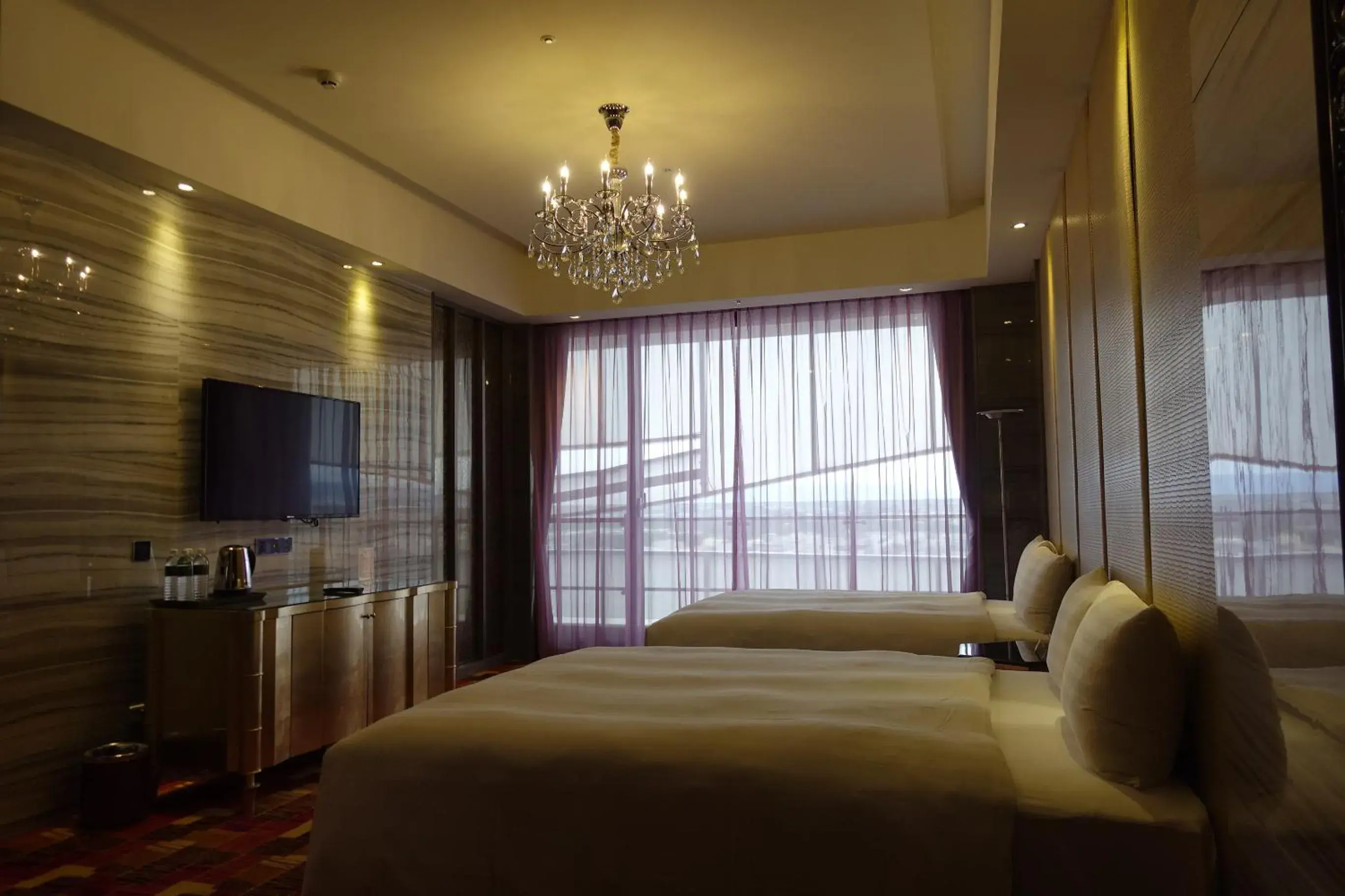 Bed in Sun Hao International Hotel