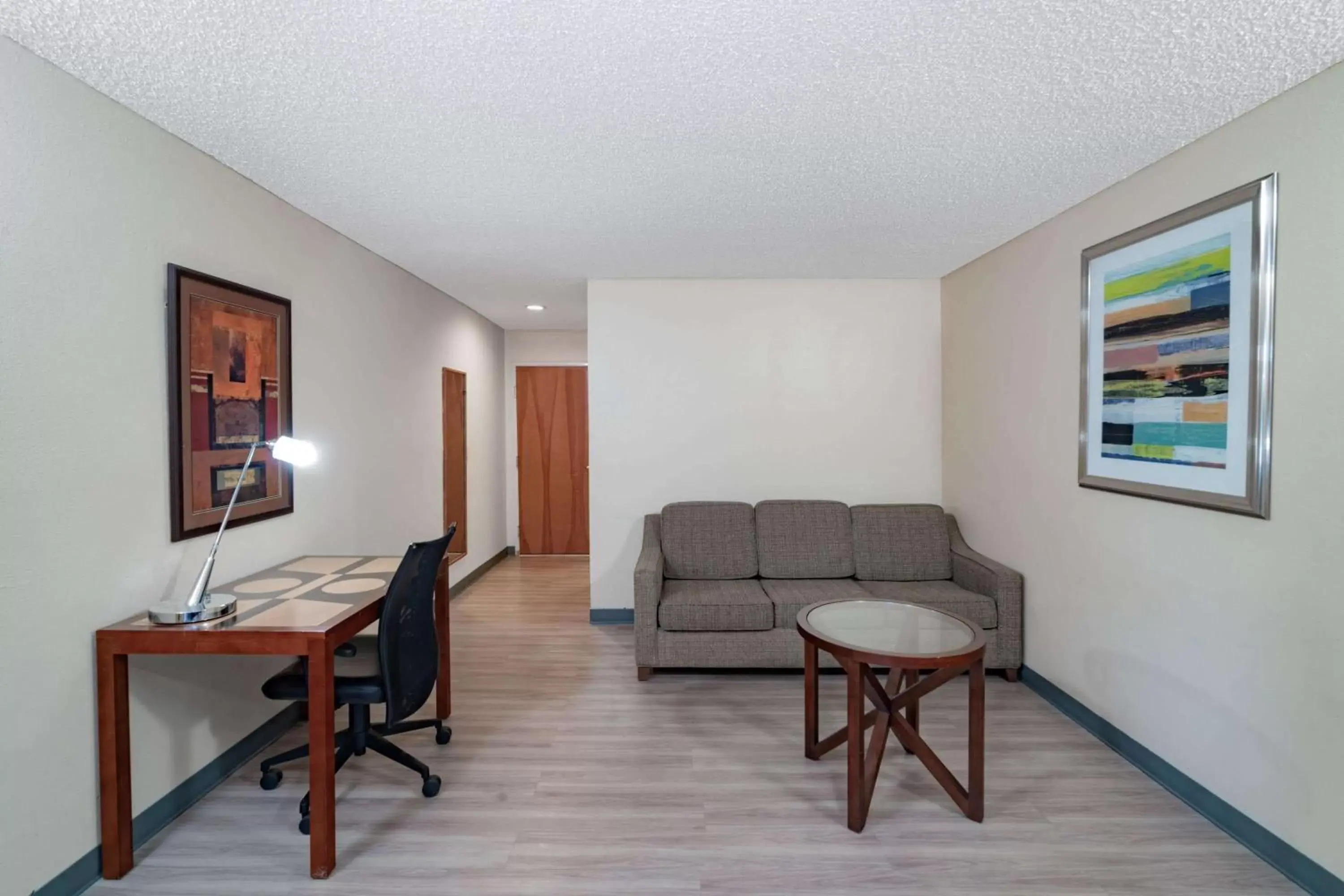 Photo of the whole room, Seating Area in Baymont by Wyndham Hinesville Fort Stewart Area