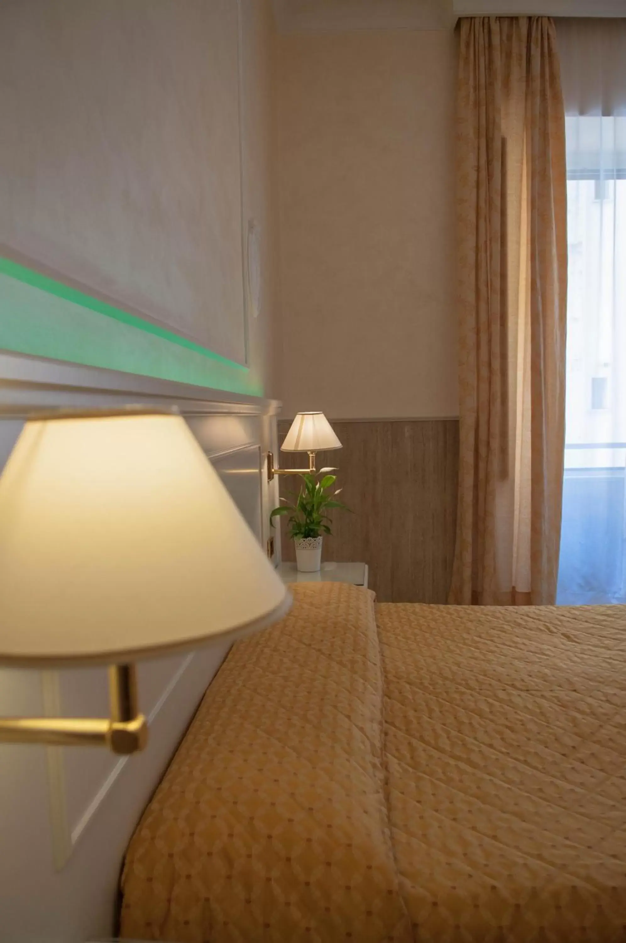 Bed in Hotel Palladium Palace