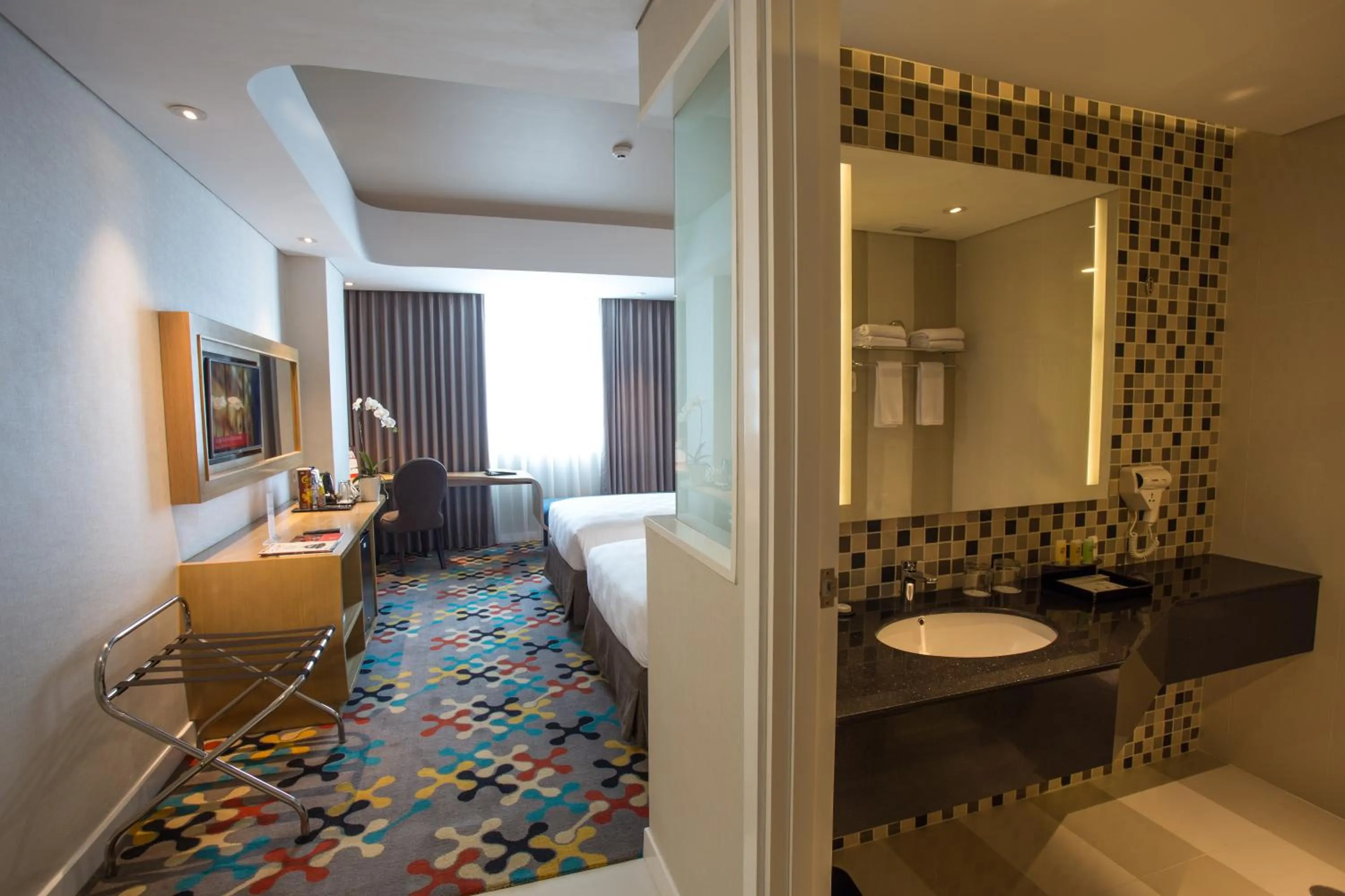 Bathroom, Bed in Hotel Ciputra Cibubur managed by Swiss-Belhotel International