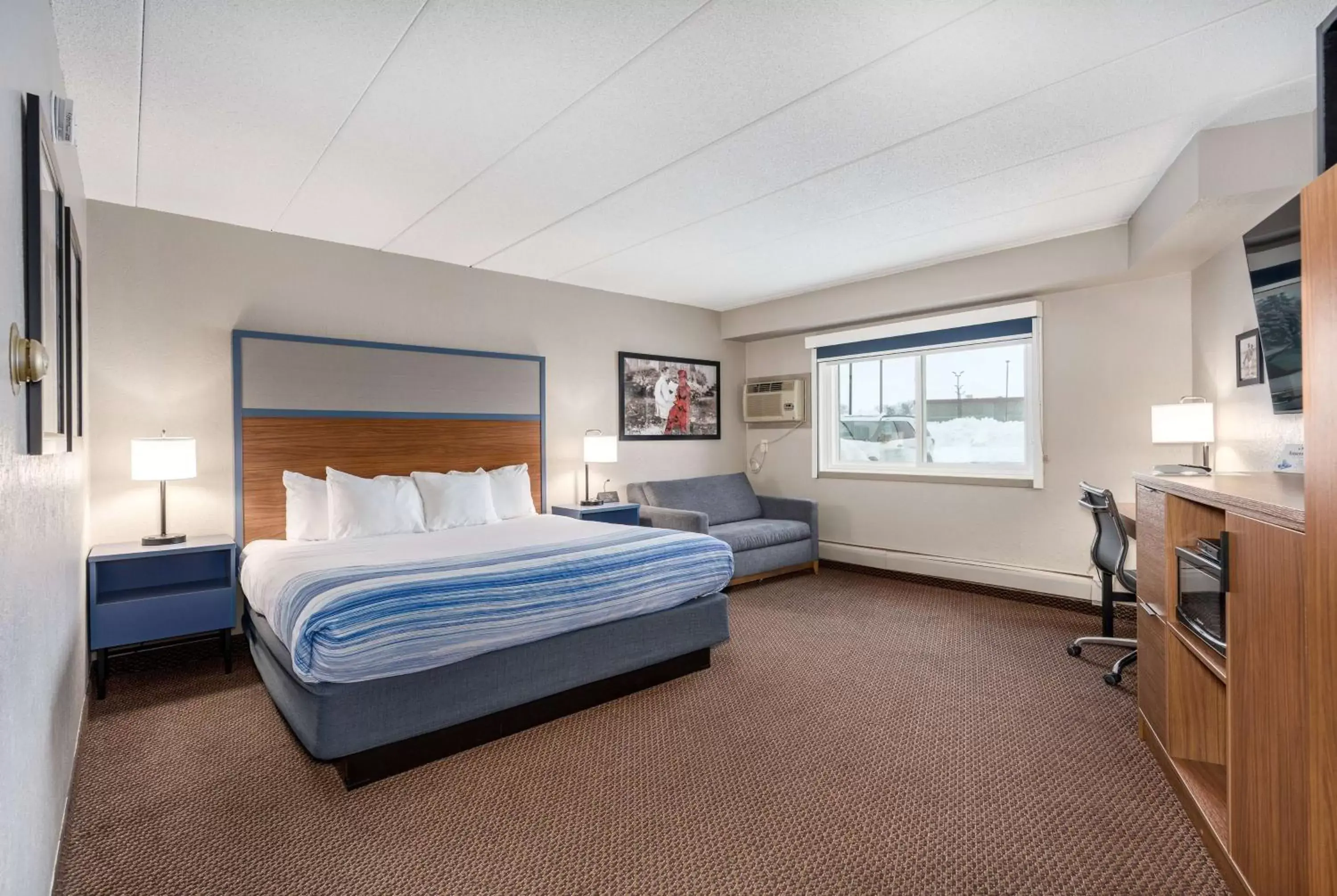 Photo of the whole room, Bed in AmericInn by Wyndham New Richmond