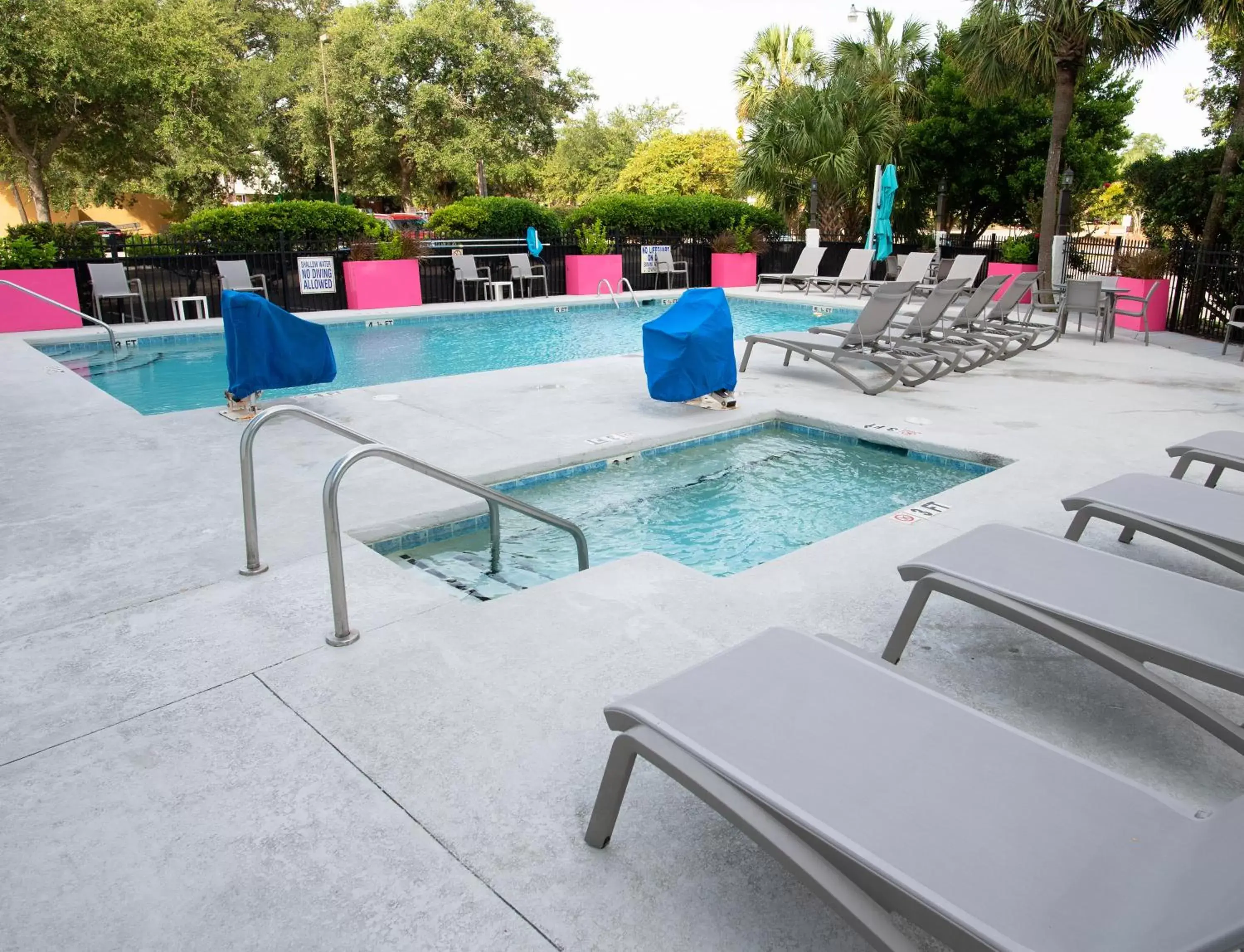 Swimming pool, Patio/Outdoor Area in Aqua Beach Inn