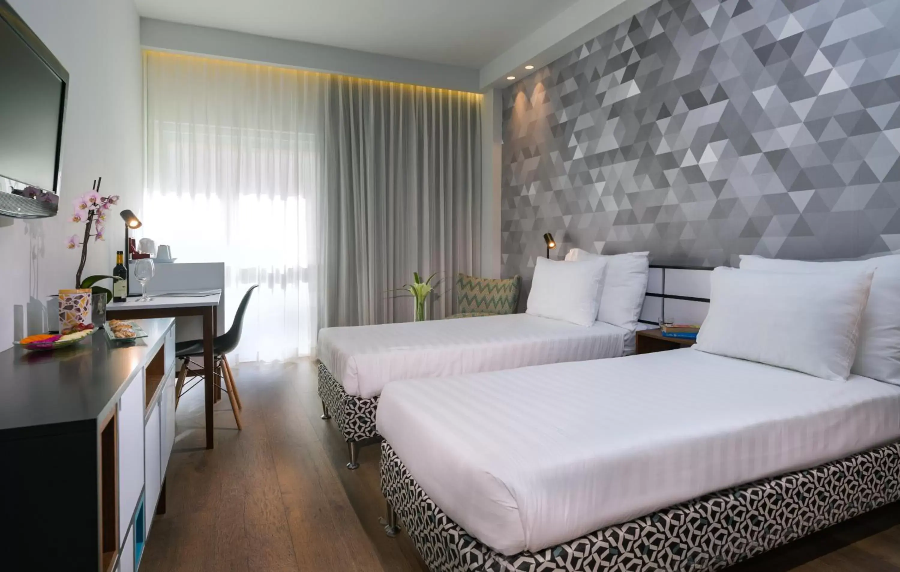 Bedroom, Bed in Prima Tel Aviv Hotel