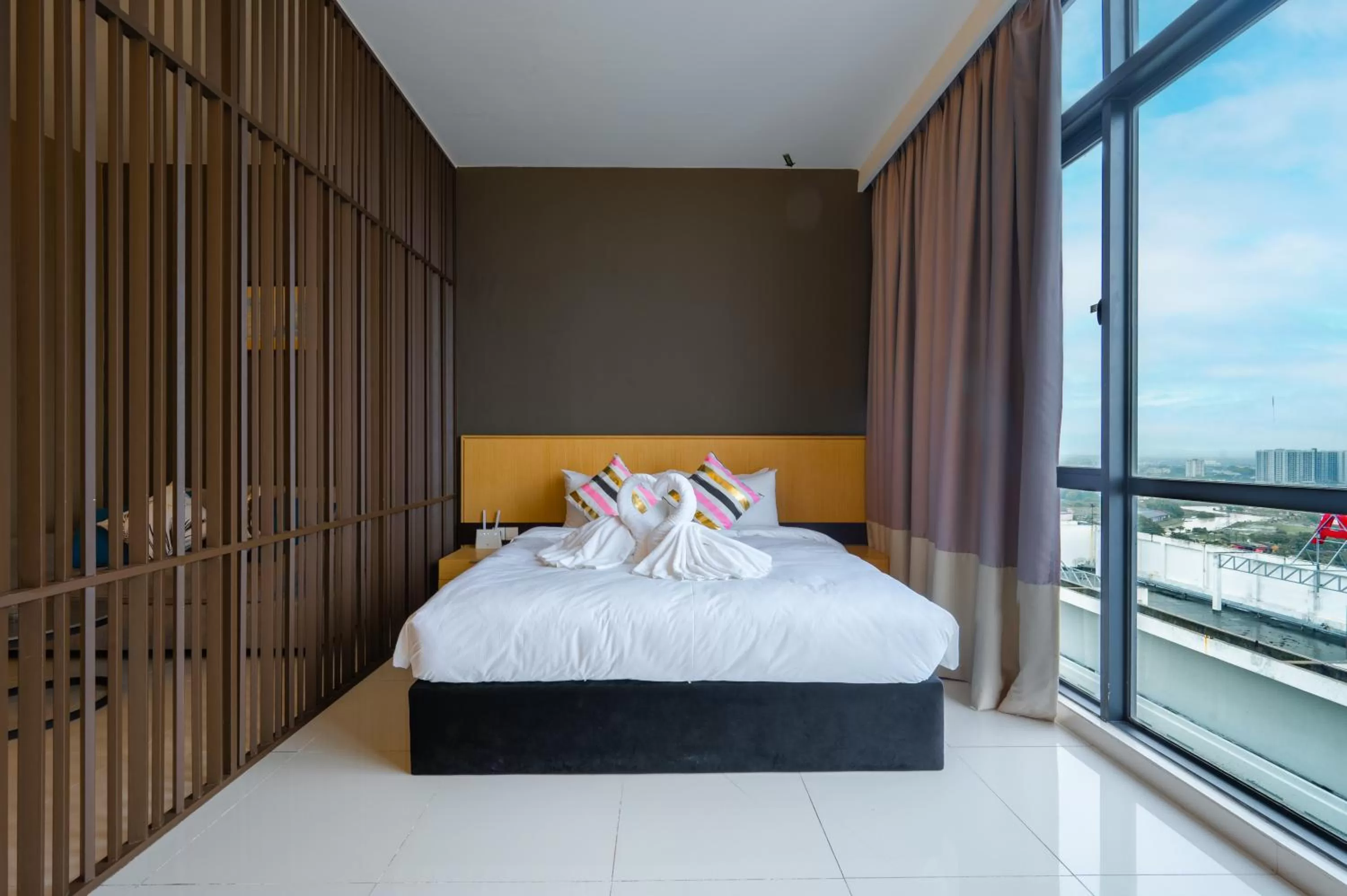 Bed in Greystone 99 Suites